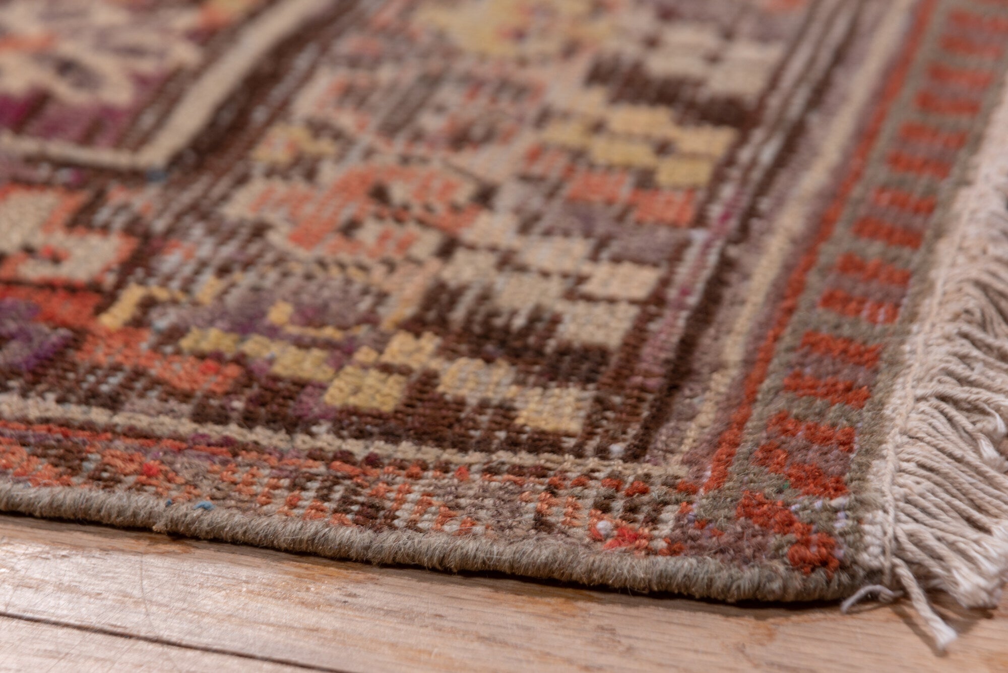 6' x 12' one-of-a-kind handmade vintage Khotan large size rug. Color palette: red, brown, pink, gray