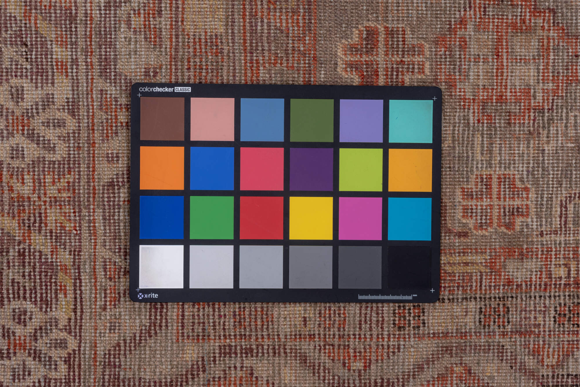 6' x 12' one-of-a-kind handmade vintage Khotan large size rug. Color palette: red, brown, pink, gray