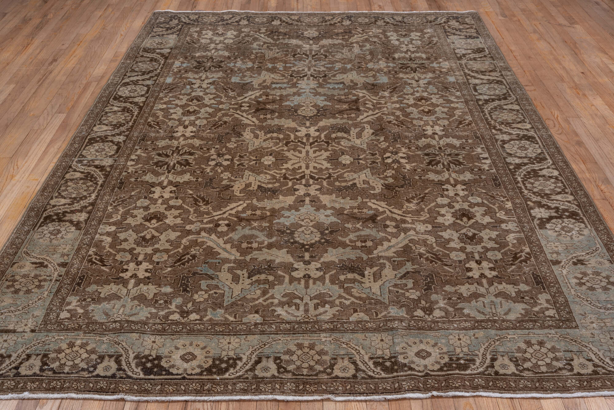 6' x 10' one-of-a-kind handmade vintage Heriz large size rug. Color palette: brown, gray, light gray, off-white, pink, snow