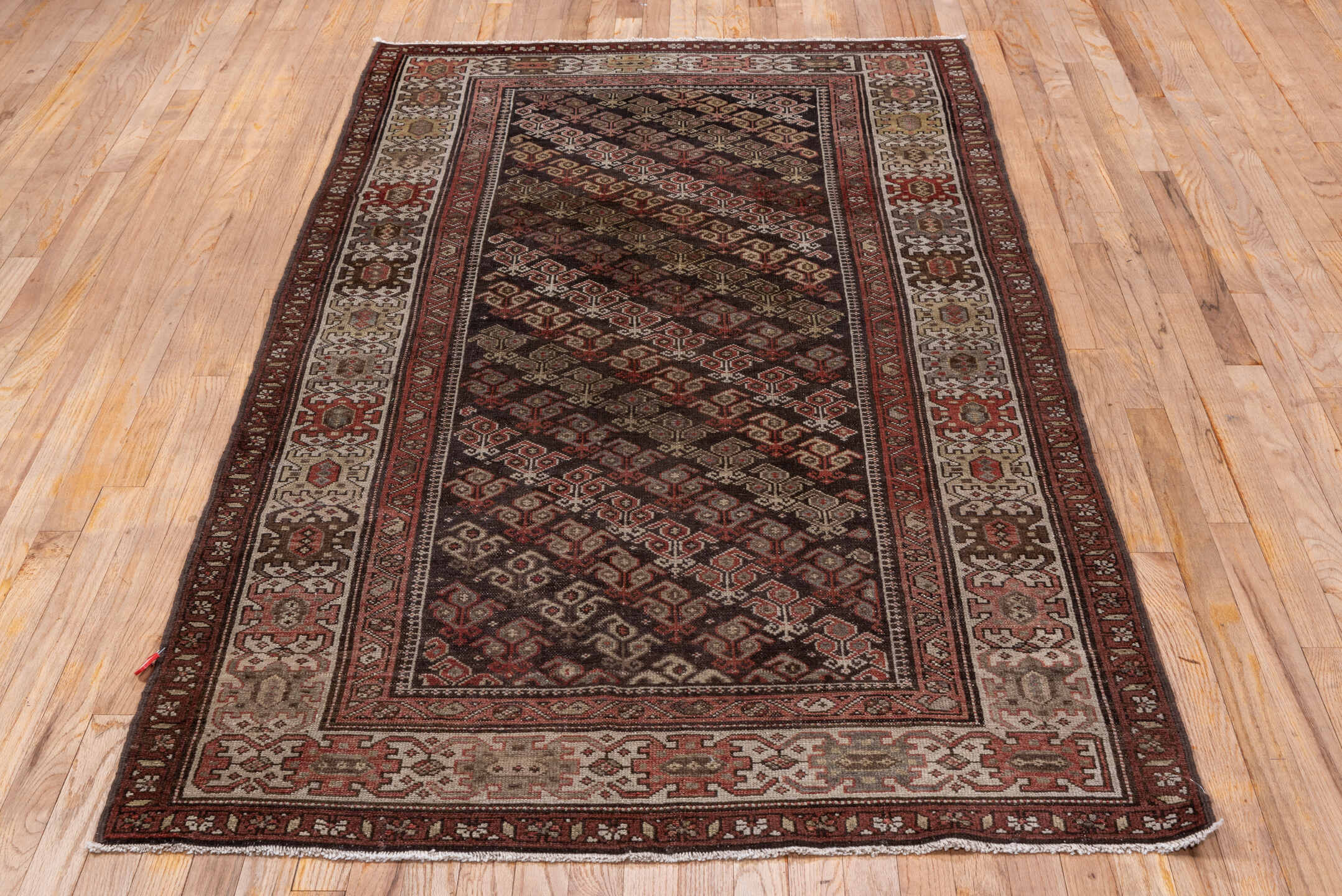 4' x 8' one-of-a-kind handmade vintage Malayer runner rug. Color palette: gray, pink, brown, red, light gray, redwood
