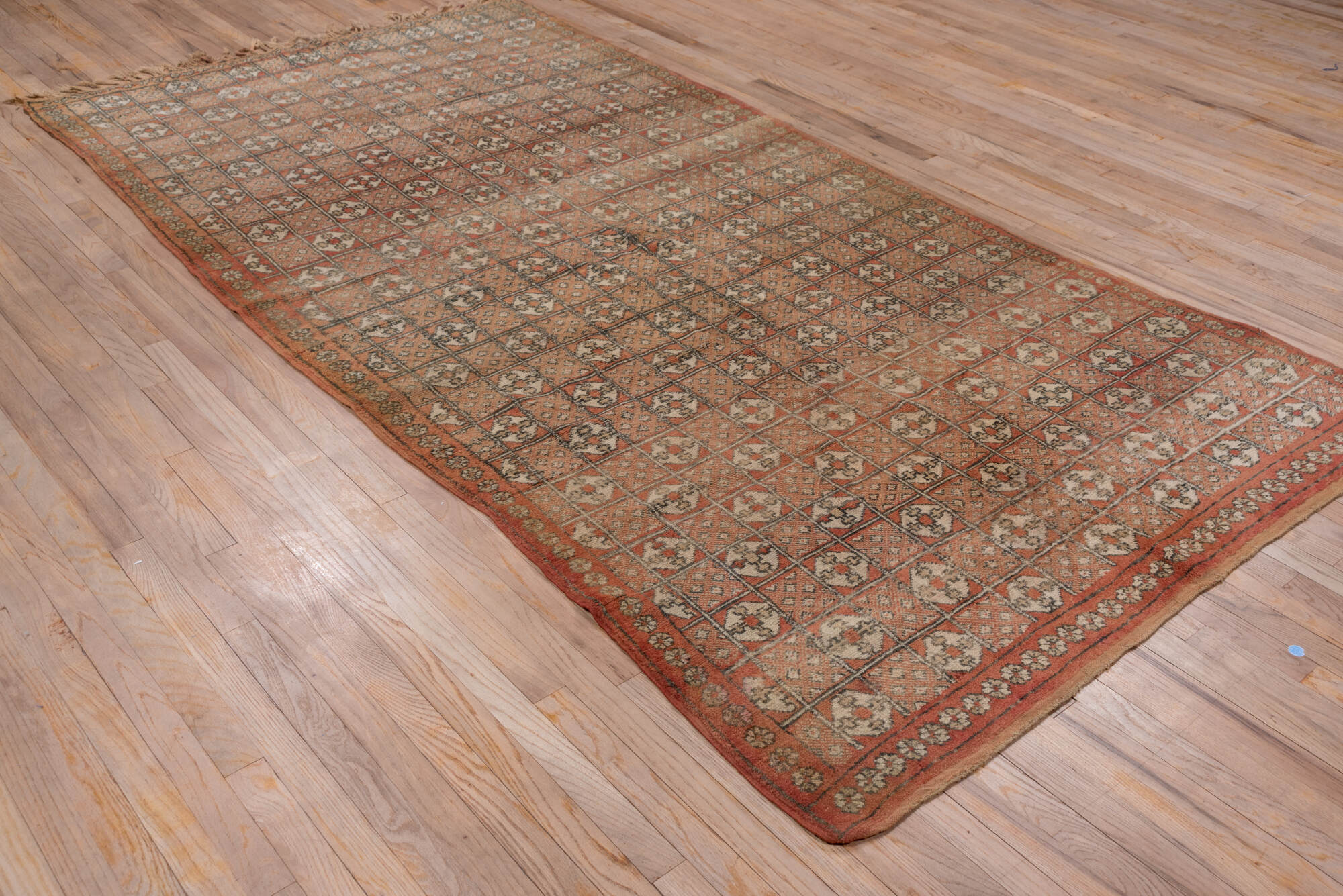 5' x 10' one-of-a-kind handmade vintage Moroccan medium size rug. Color palette: brown, gray, pink