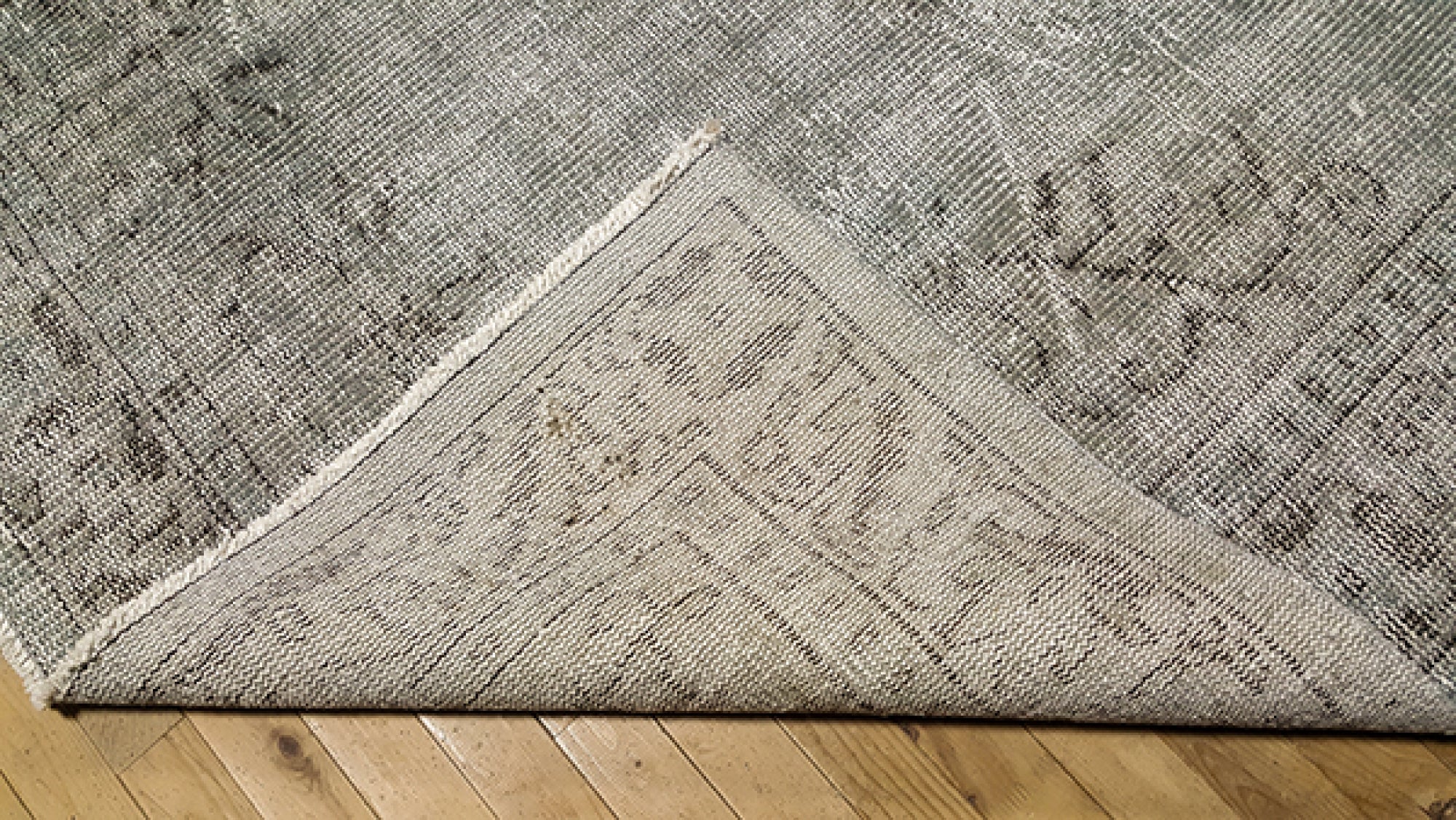5' x 9' one-of-a-kind handmade vintage Overdyed medium size rug. Color palette: gray, light gray, off-white, light blue