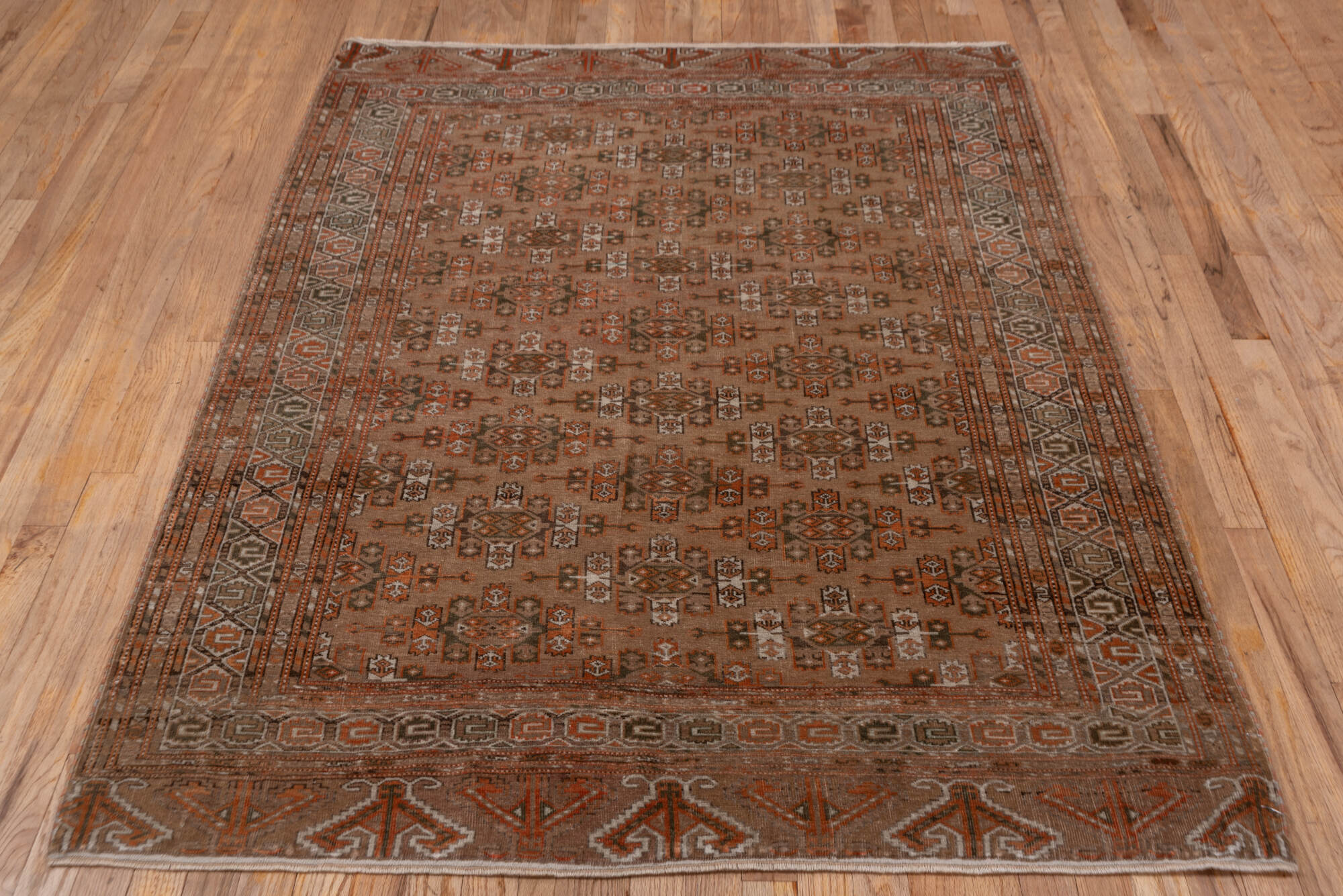 4' x 6' one-of-a-kind handmade vintage Torkaman small size rug. Color palette: brown, gray, light gray, pink
