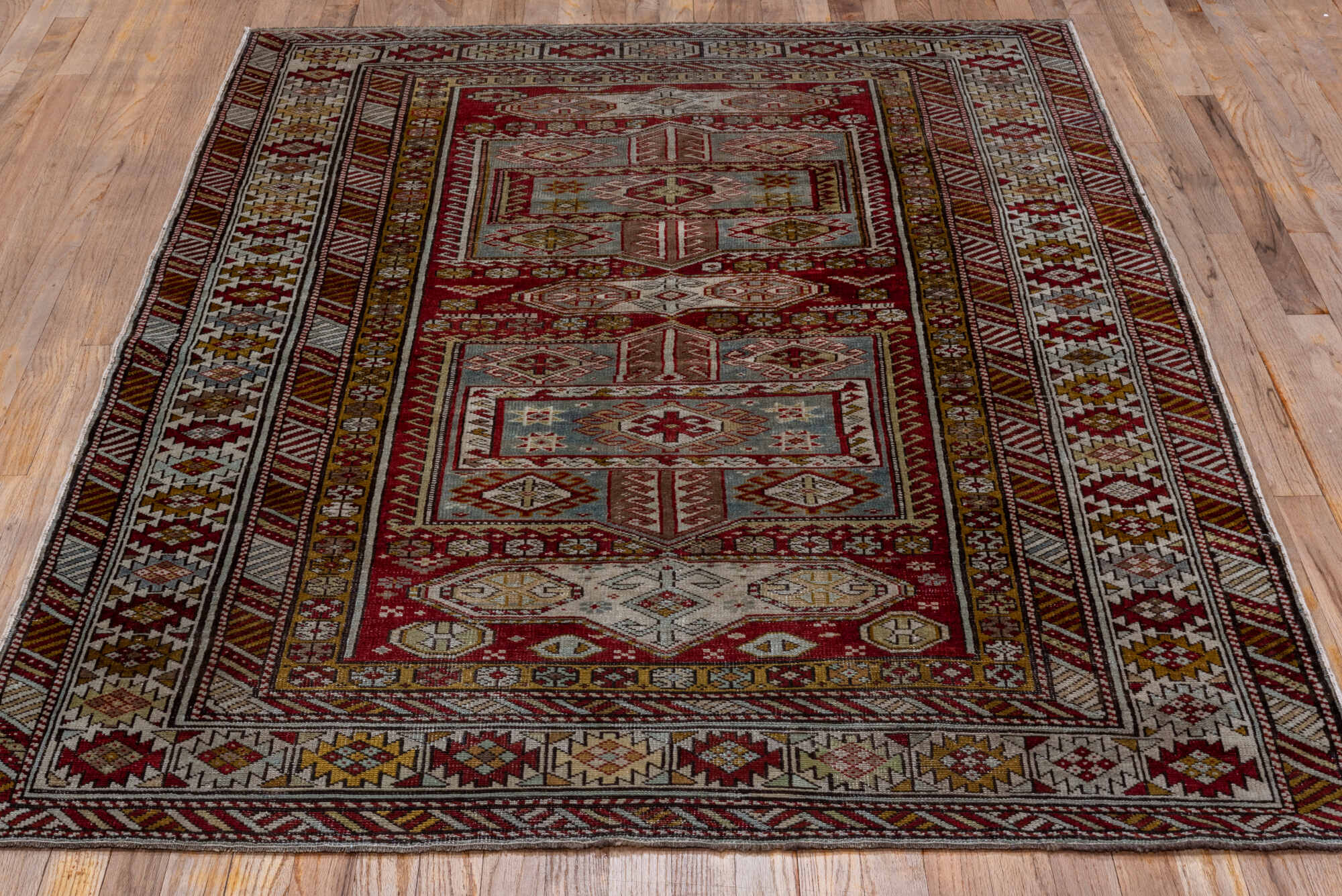 4' x 6' one-of-a-kind handmade vintage Shirvan small size rug. Color palette: brown, gray, pink, red