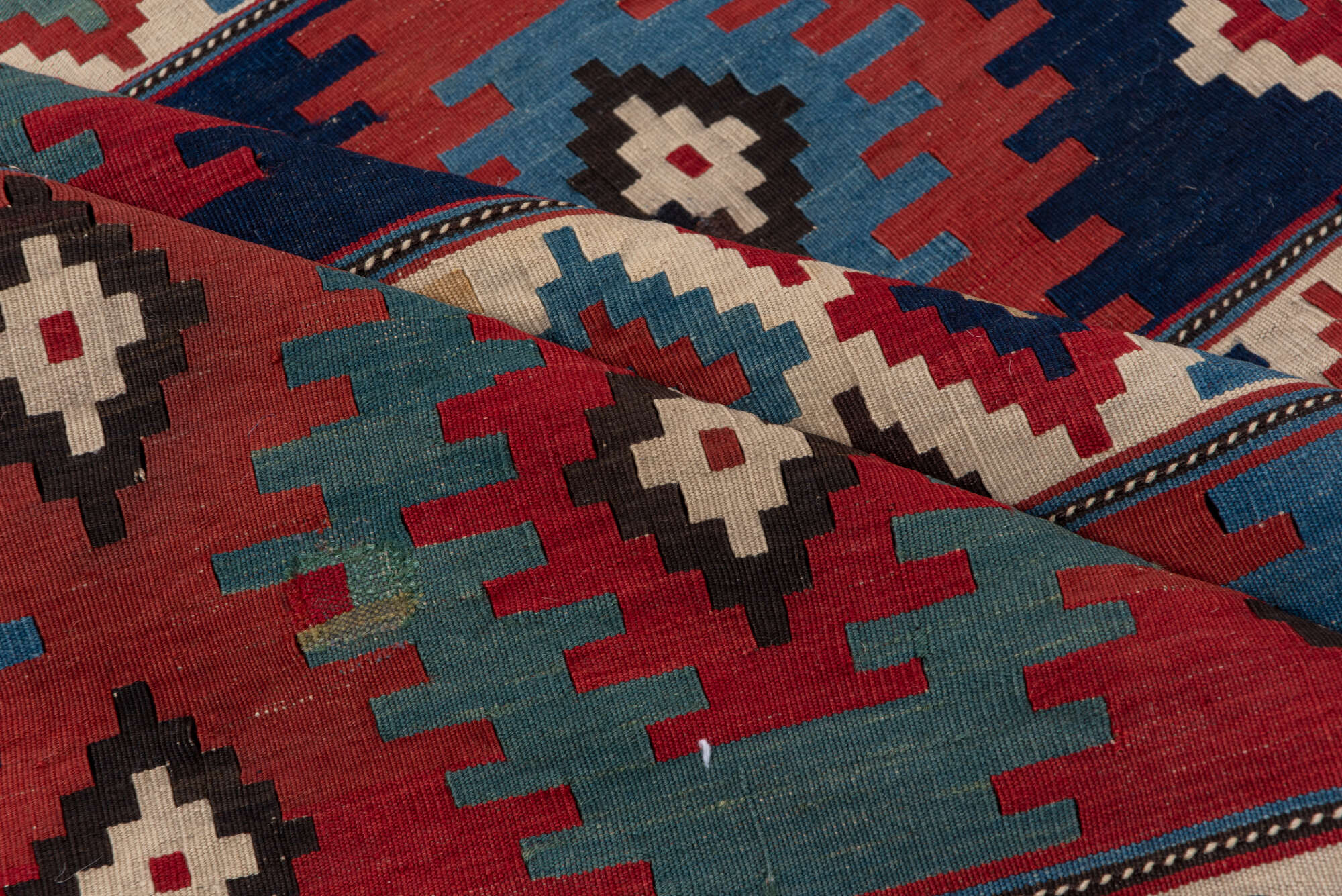 3' x 6' one-of-a-kind handmade vintage Shirvan runner rug. Color palette: arapawa, blue, brown, fiord, gray, pink, red