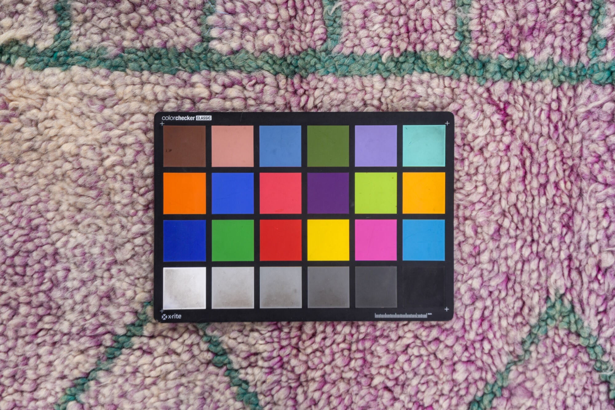 5' x 6' one-of-a-kind handmade vintage Moroccan rug. Color palette: brown, gray, light gray, pink, red