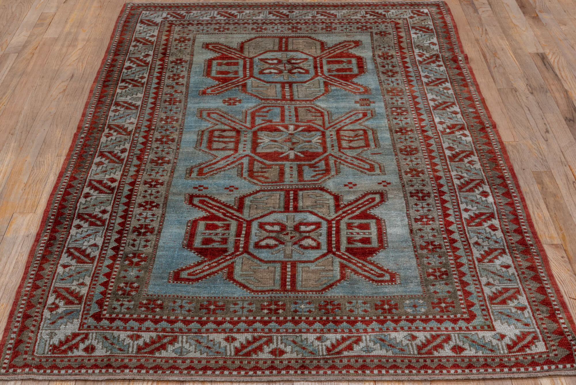 4' x 7' one-of-a-kind handmade vintage Kazak rug. Color palette: brown, gray, pink