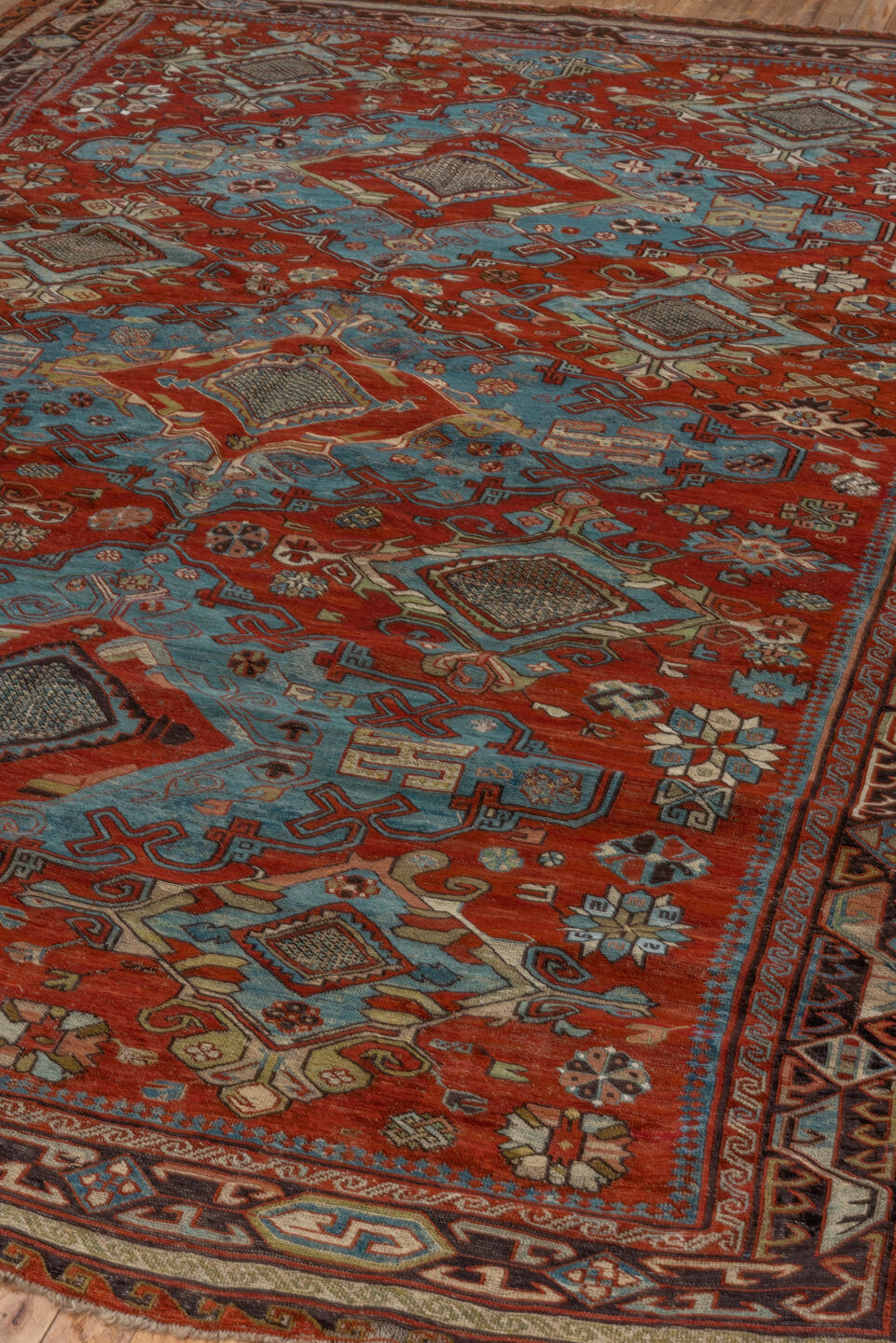 6' x 8' one-of-a-kind handmade vintage Sumak medium size rug. Color palette: blue, gray, brown, red, off-white, black