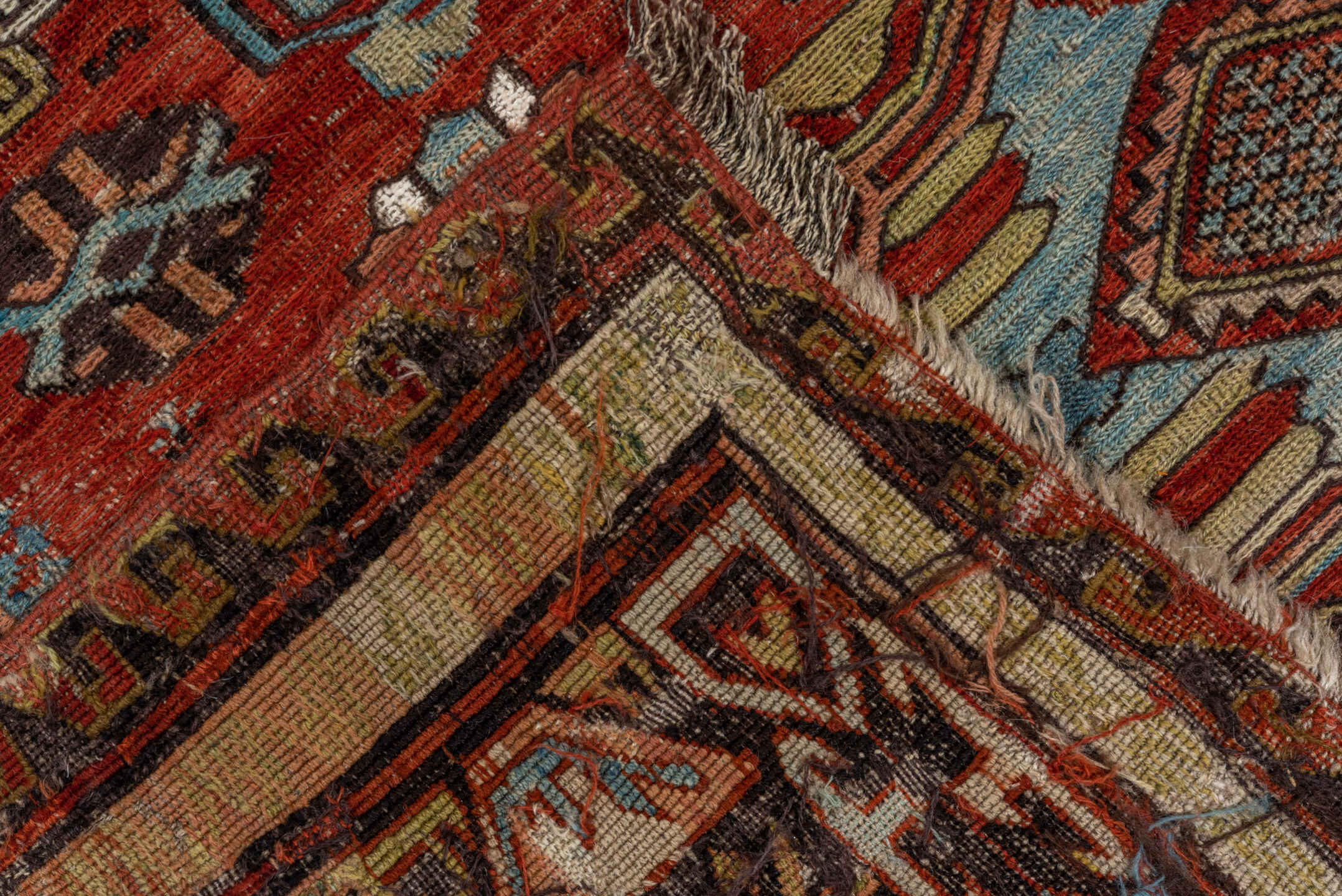 6' x 8' one-of-a-kind handmade vintage Sumak medium size rug. Color palette: blue, gray, brown, red, off-white, black