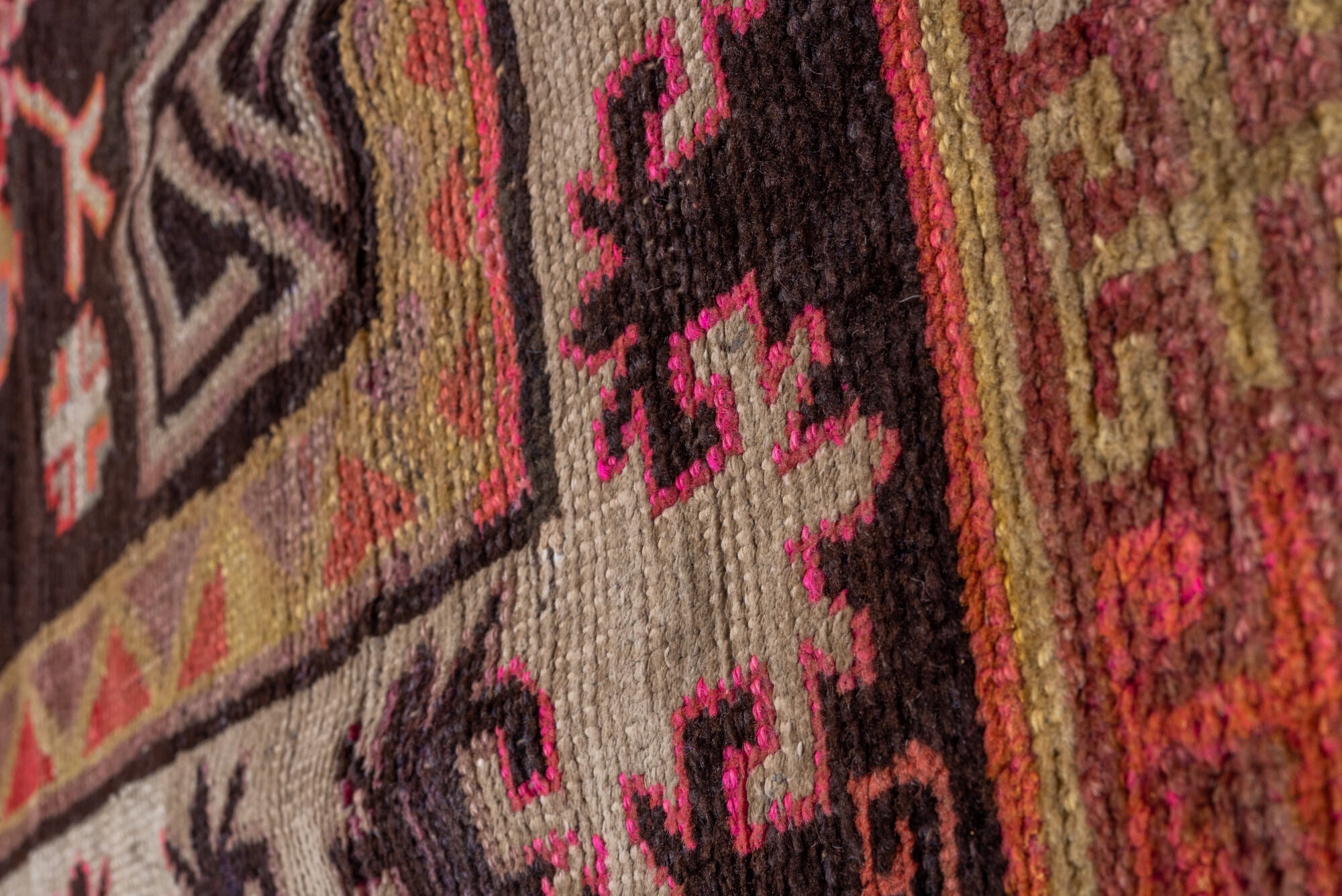 5' x 8' one-of-a-kind handmade vintage Khotan medium size rug. Color palette: black, brown, gray, pink, red