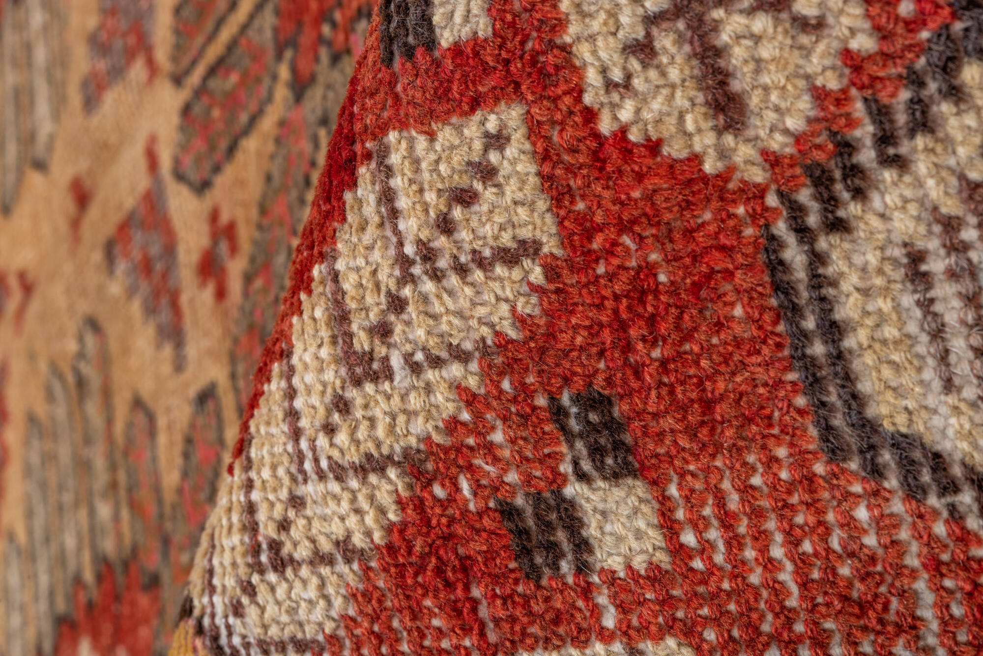 5' x 8' one-of-a-kind handmade vintage Khotan medium size rug. Color palette: brown, dark red, off-white, orange, red, tan