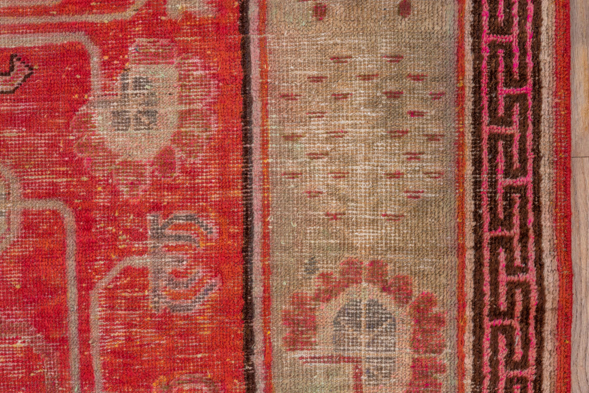 5' x 10' one-of-a-kind handmade vintage Khotan runner rug. Color palette: brown, fire brick, light coral, off-white, pink