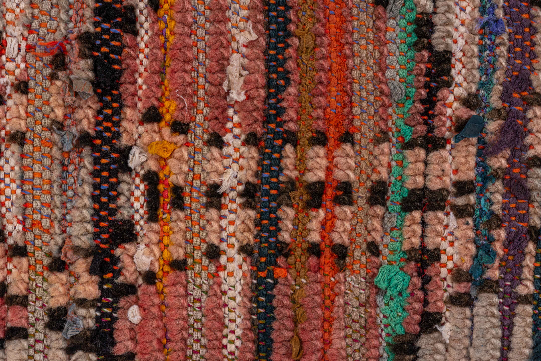 3' x 8' one-of-a-kind handmade vintage Moroccan runner rug. Color palette: pink, brown, blue, green, gray, red, orange