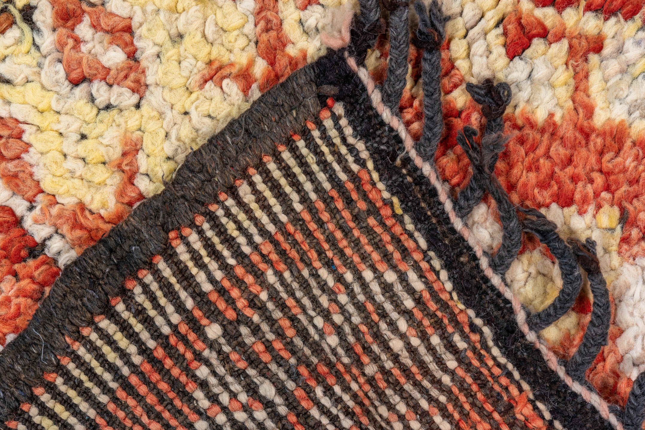 5' x 9' one-of-a-kind handmade vintage Moroccan medium size rug. Color palette: brown, light gray, gray, off-white, pink