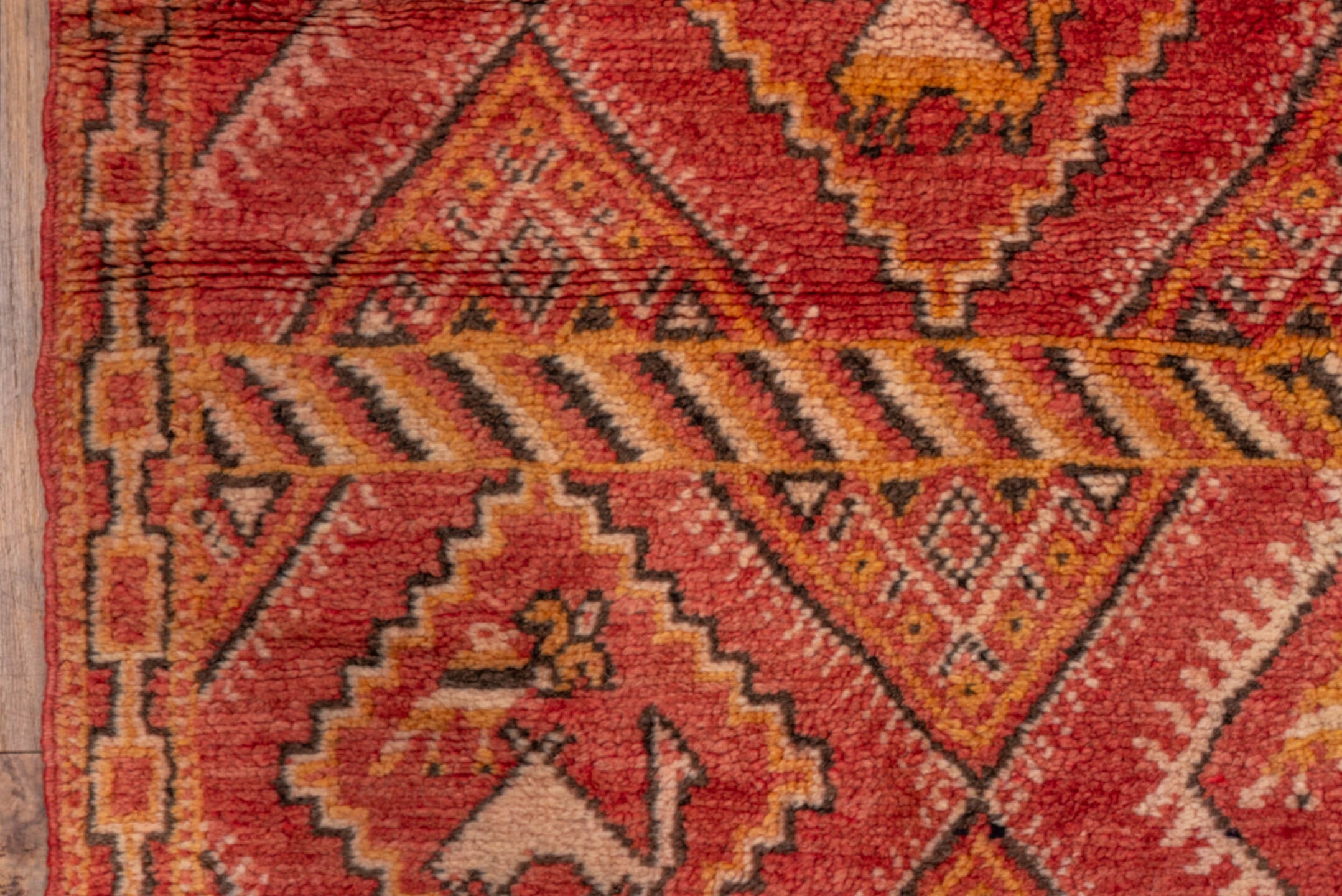 5' x 8' one-of-a-kind handmade vintage Moroccan medium size rug. Color palette: brown, pink, red, orange, dark red, peru