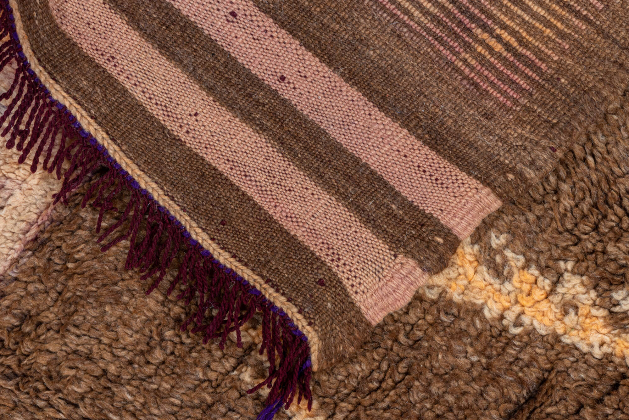 4' x 7' one-of-a-kind handmade vintage Moroccan rug. Color palette: black, blue, brown, gray, off-white, orange, pink