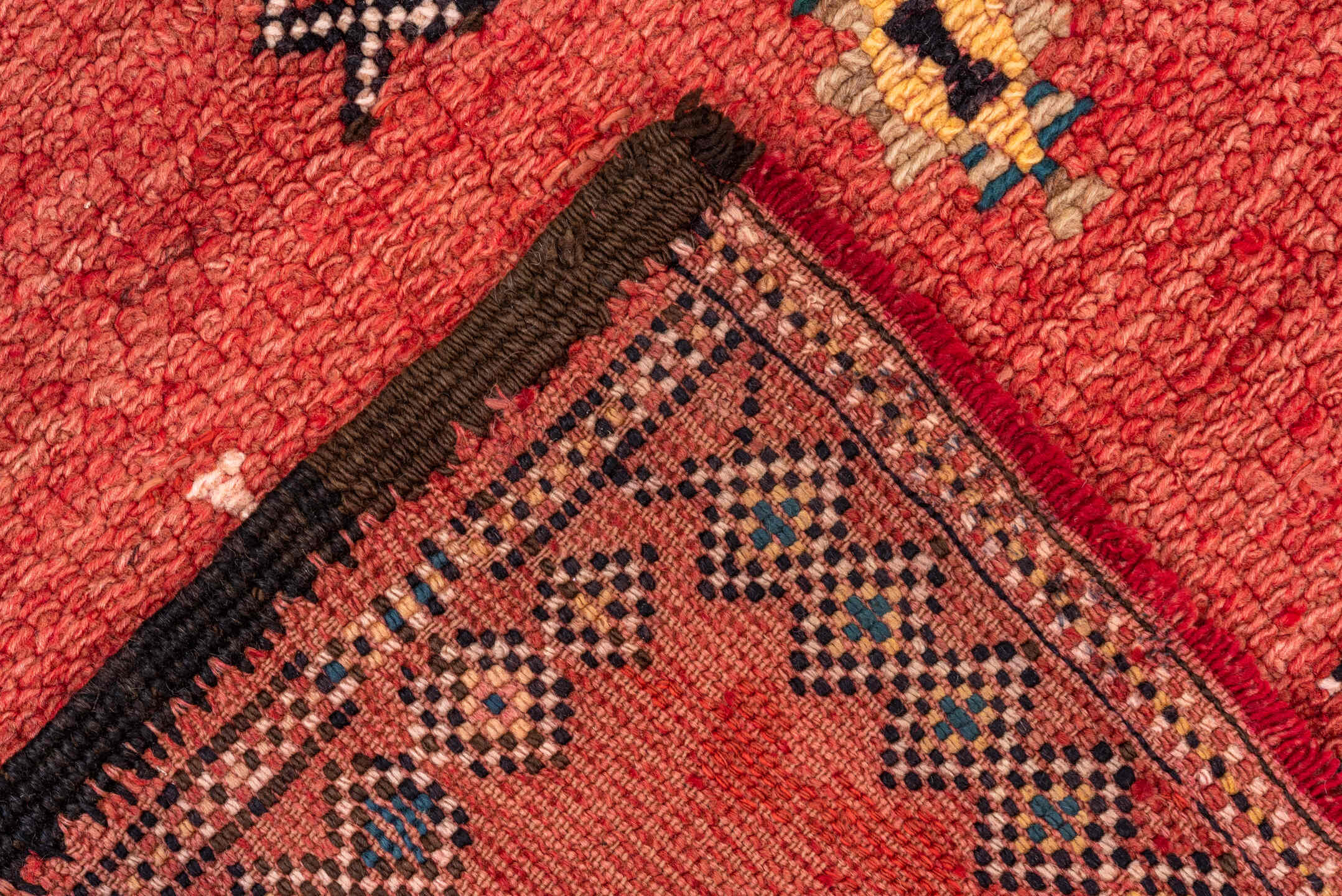 5' x 10' one-of-a-kind handmade vintage Moroccan medium size rug. Color palette: brown, red, pink, gray