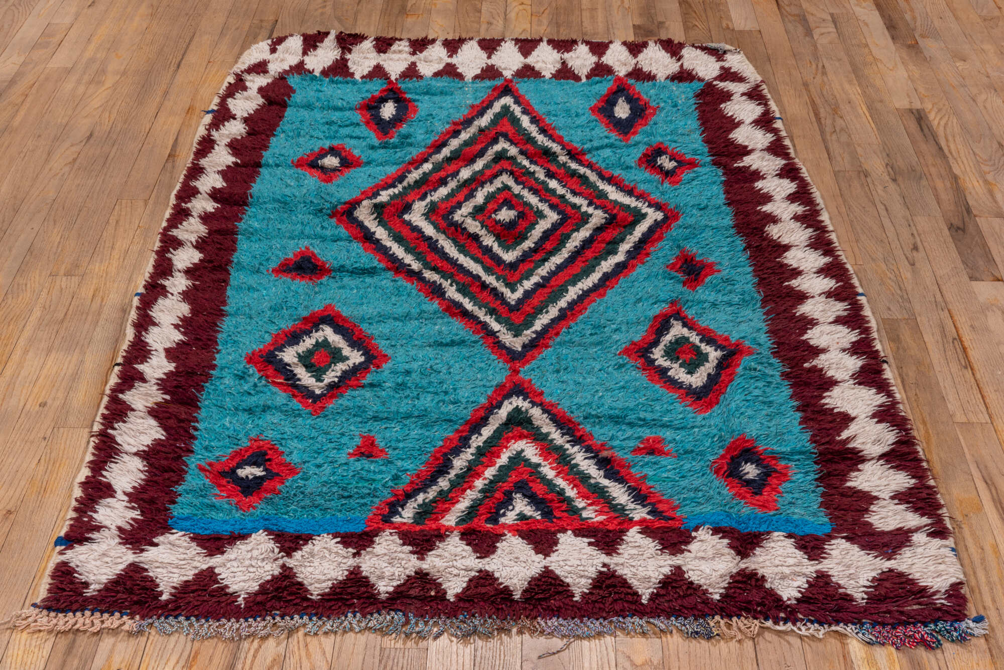 3' x 6' one-of-a-kind handmade vintage Rag Rug small size rug. Color palette: black, blue, brown, gray, light gray