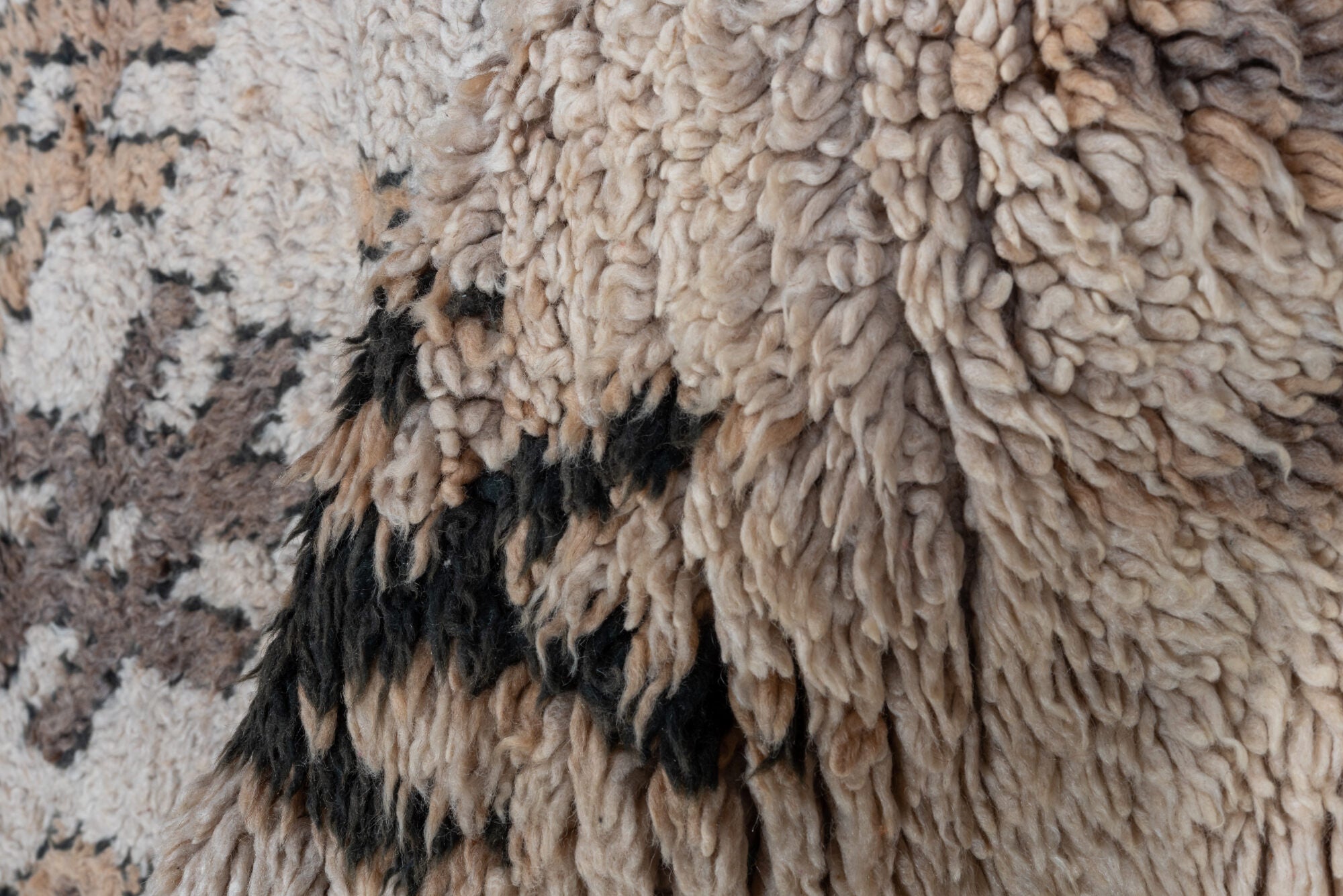 2' x 7' one-of-a-kind handmade vintage Moroccan runner rug. Color palette: black, brown, gray, light gray, off-white, pink