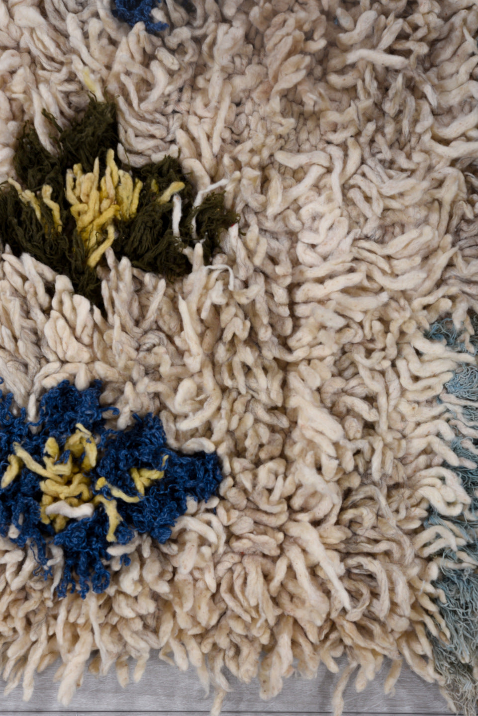 2' x 4' one-of-a-kind handmade vintage Moroccan small size rug. Color palette: gray, blue, light gray, off-white, black