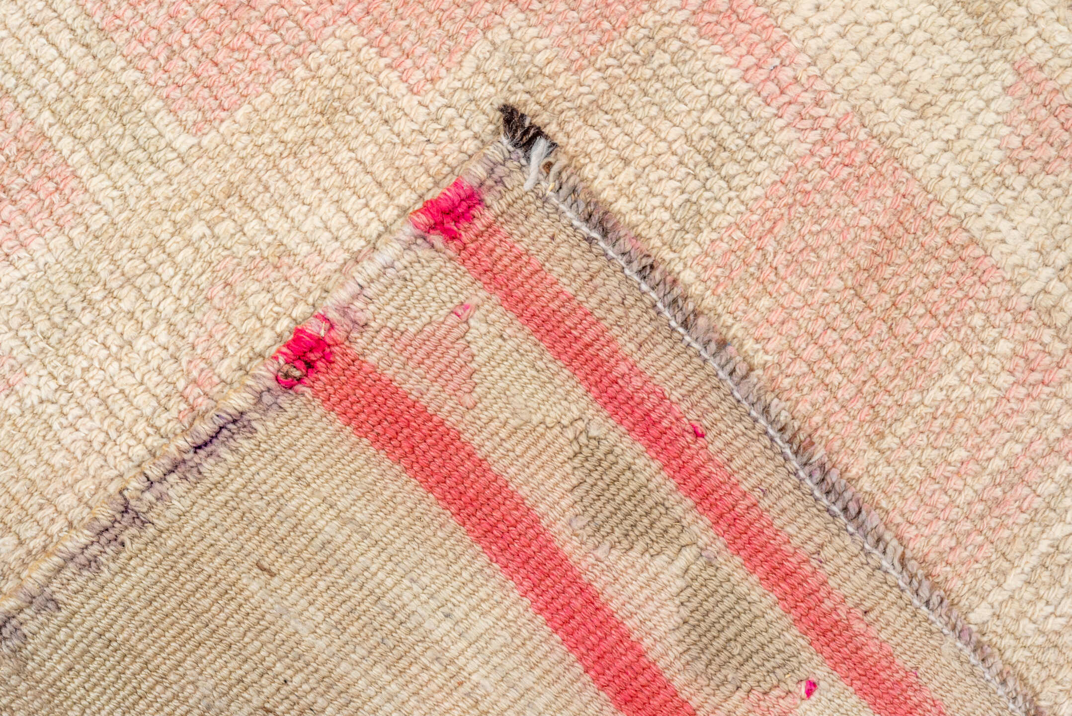 2' x 10' one-of-a-kind handmade vintage Kars runner rug. Color palette: orange, brown, off-white, pink, red, white, snow