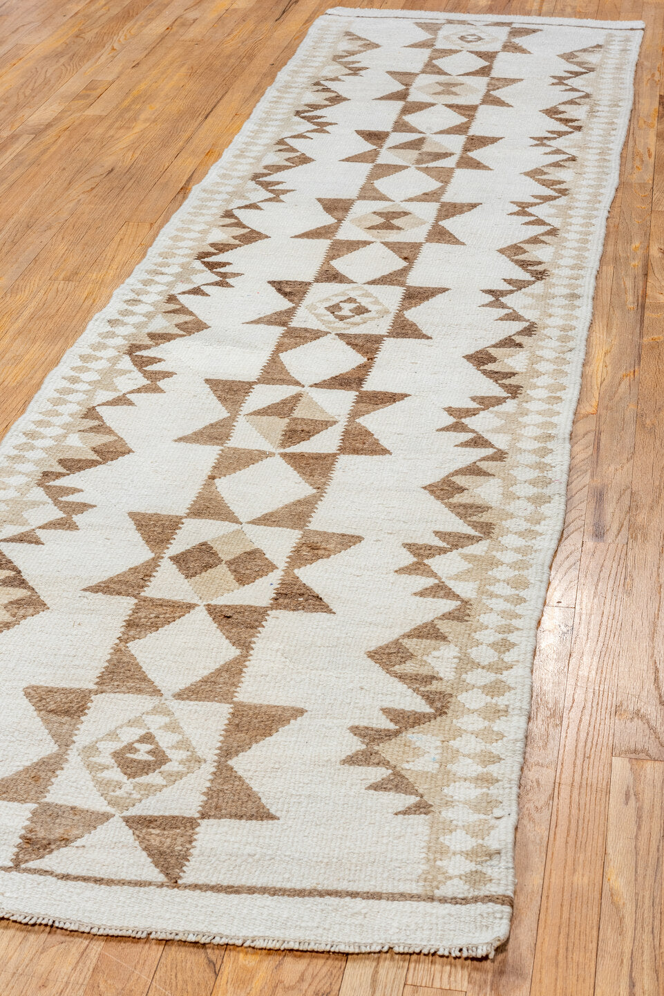 2' x 11' one-of-a-kind handmade vintage Kilim runner rug. Color palette: brown, off-white, gray, pink, light gray, orange