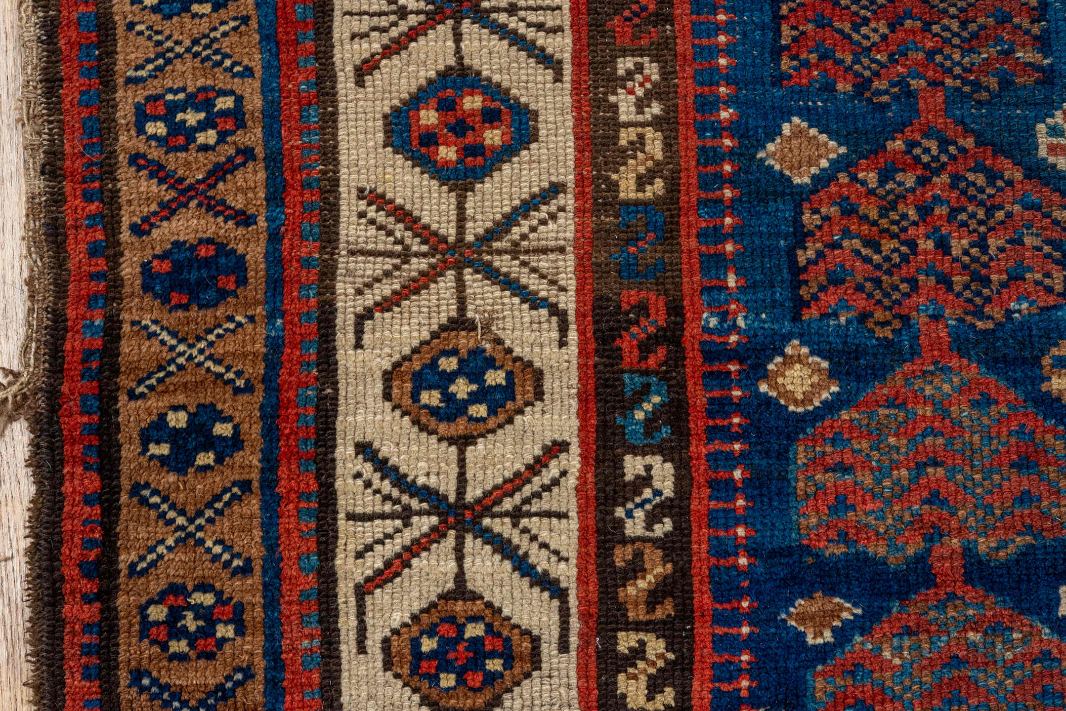 5' x 8' one-of-a-kind handmade vintage Kurd medium size rug. Color palette: brown, gray, red, blue, pink, dim gray