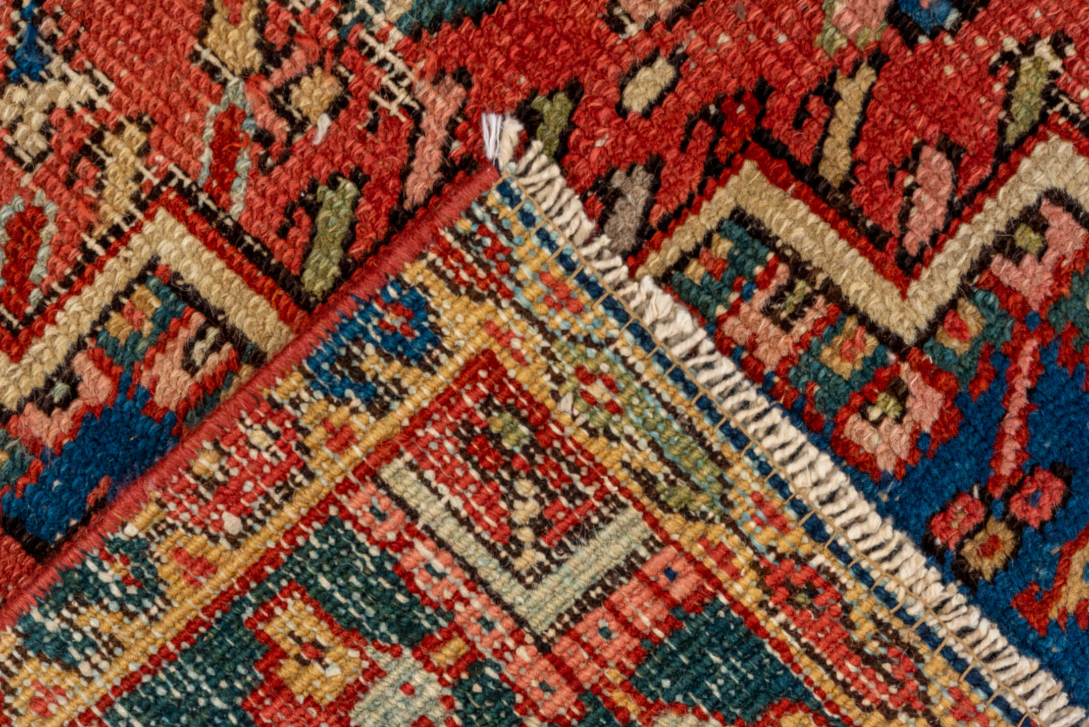 5' x 8' one-of-a-kind handmade vintage Heriz medium size rug. Color palette: brown, orange, gray, blue, pink, red, arapawa