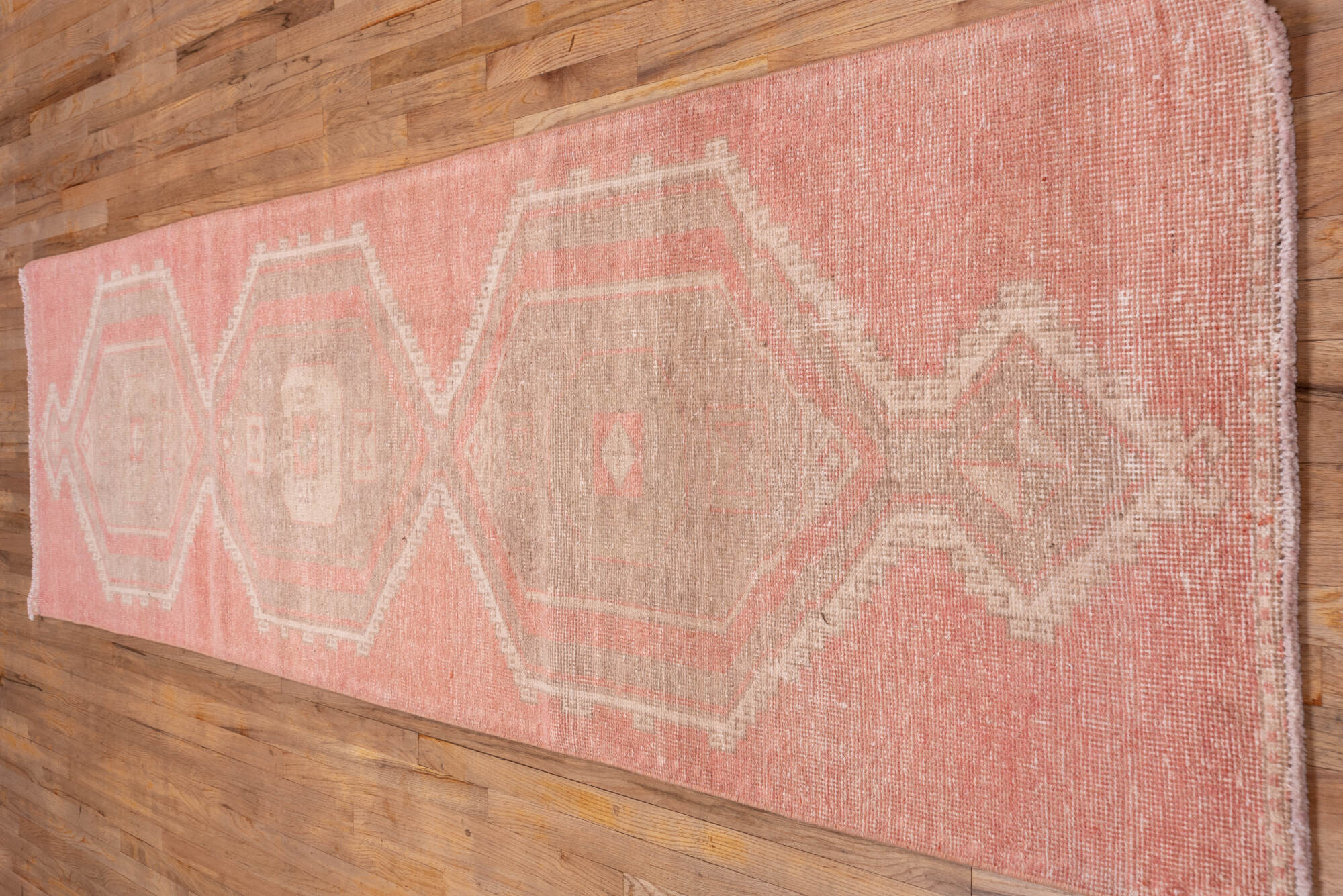 3' x 11' one-of-a-kind handmade vintage Oushak runner rug. Color palette: brown, off-white, orange, pink, snow, white