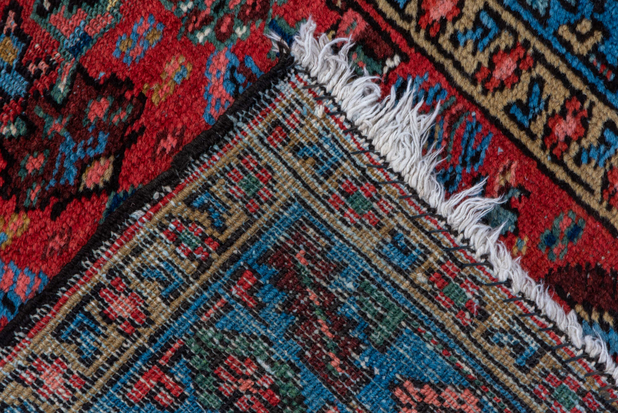 2' x 13' one-of-a-kind handmade vintage Heriz runner rug. Color palette: black, blue, brown, fiord, gray, indian red, pink