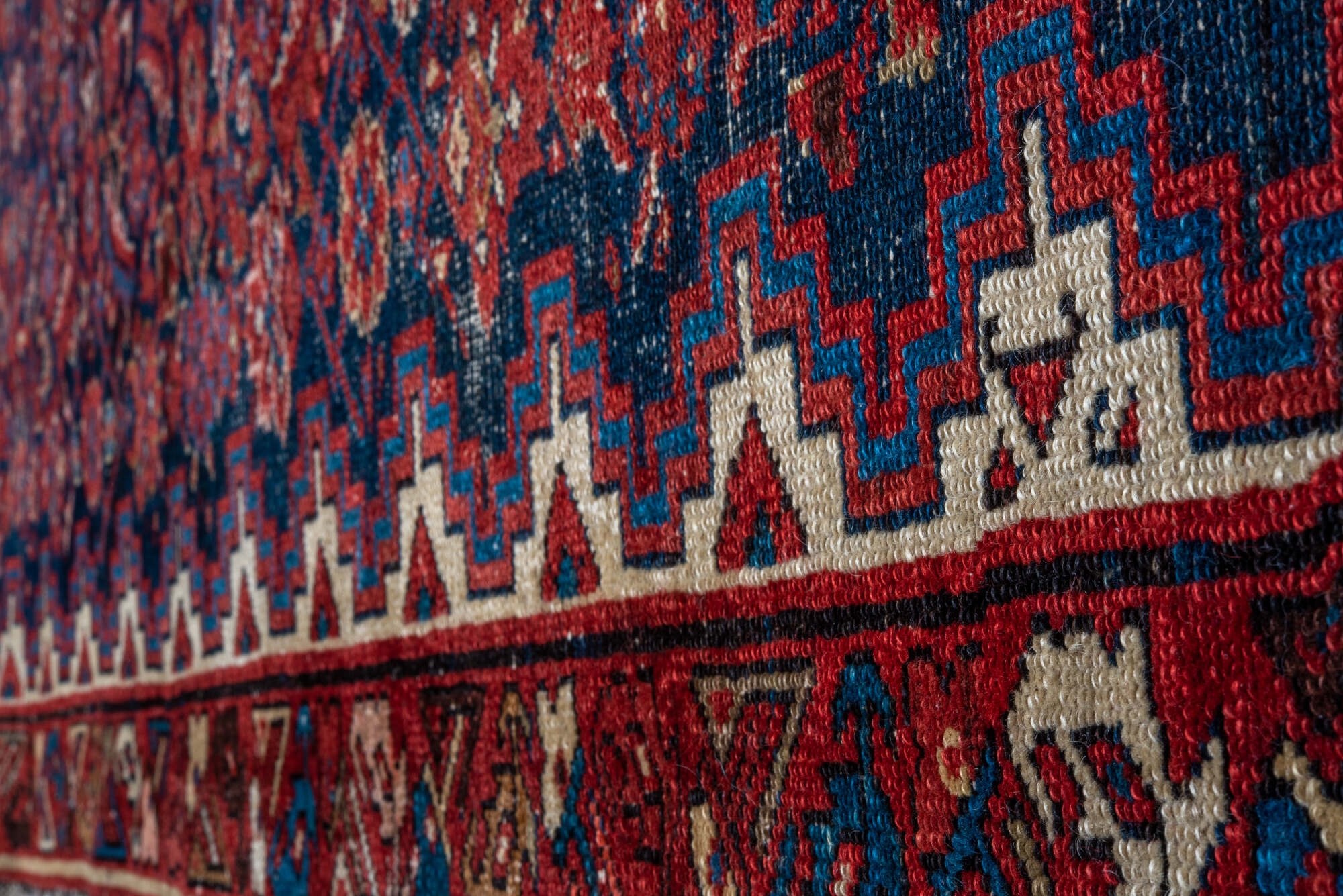 3' x 16' one-of-a-kind handmade vintage Malayer runner rug. Color palette: black, blue, brown, gray, pink, red, redwood