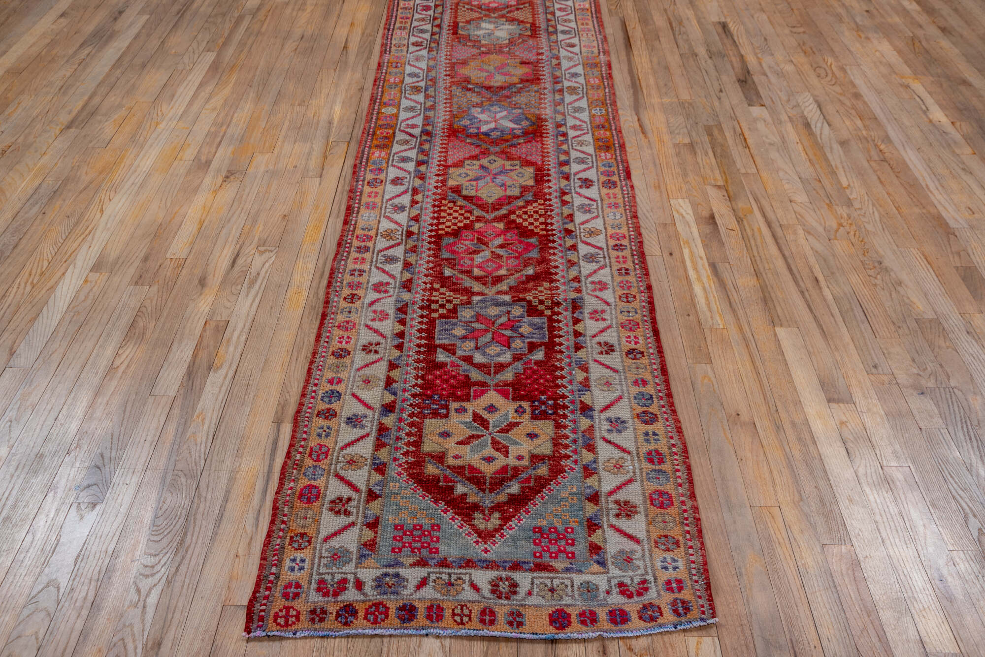 2' x 11' one-of-a-kind handmade vintage Oushak runner rug. Color palette: brown, dark salmon, gray, indian red, light gray