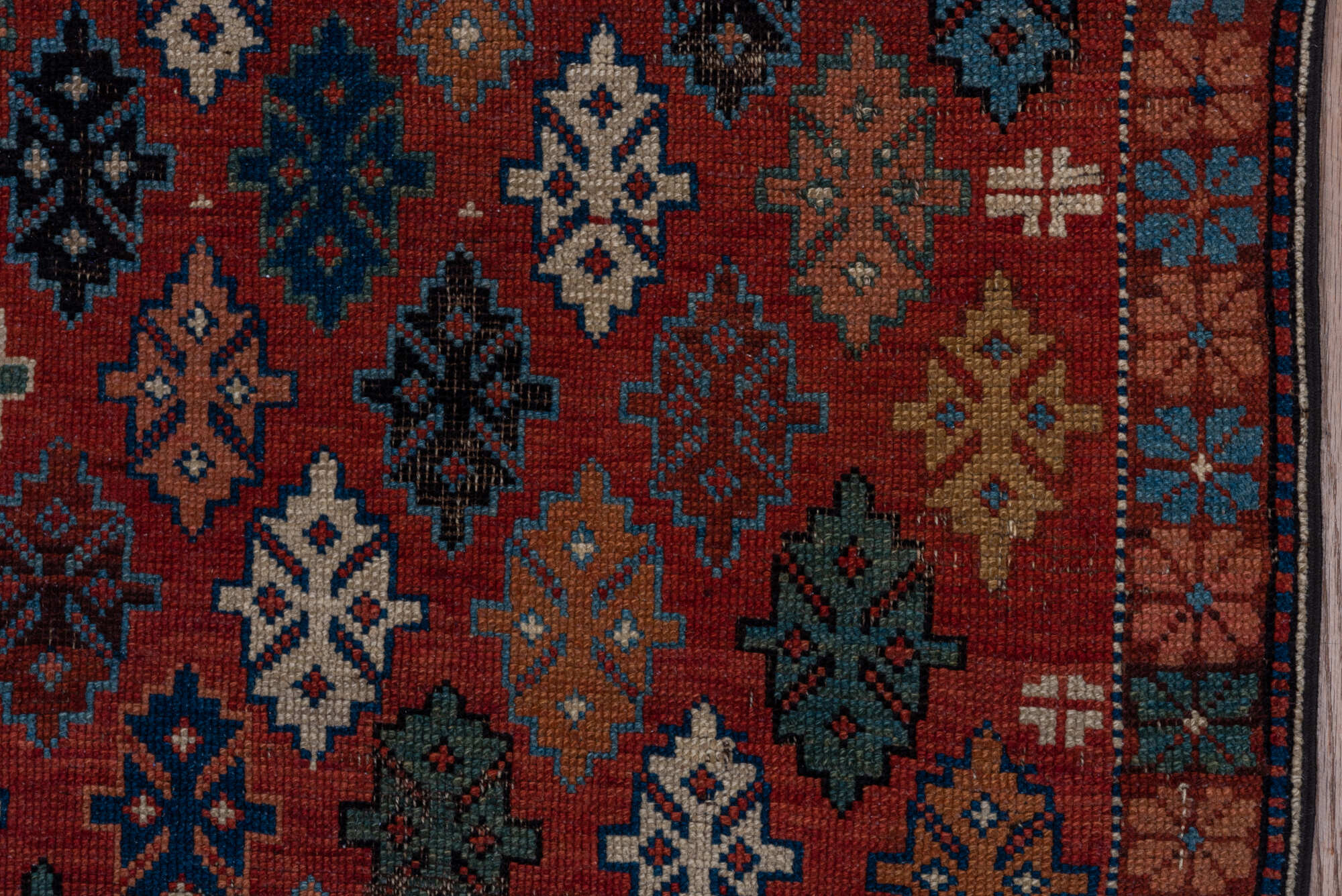 2' x 4' one-of-a-kind handmade vintage Shirvan small size rug. Color palette: black, brown, gray, pink, red