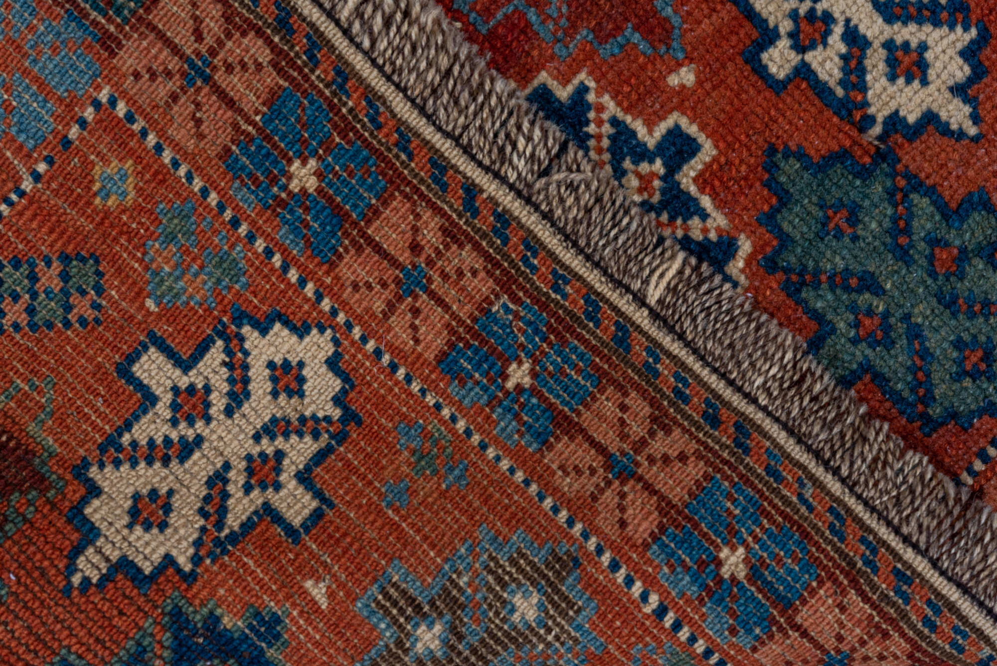 2' x 4' one-of-a-kind handmade vintage Shirvan small size rug. Color palette: black, brown, gray, pink, red