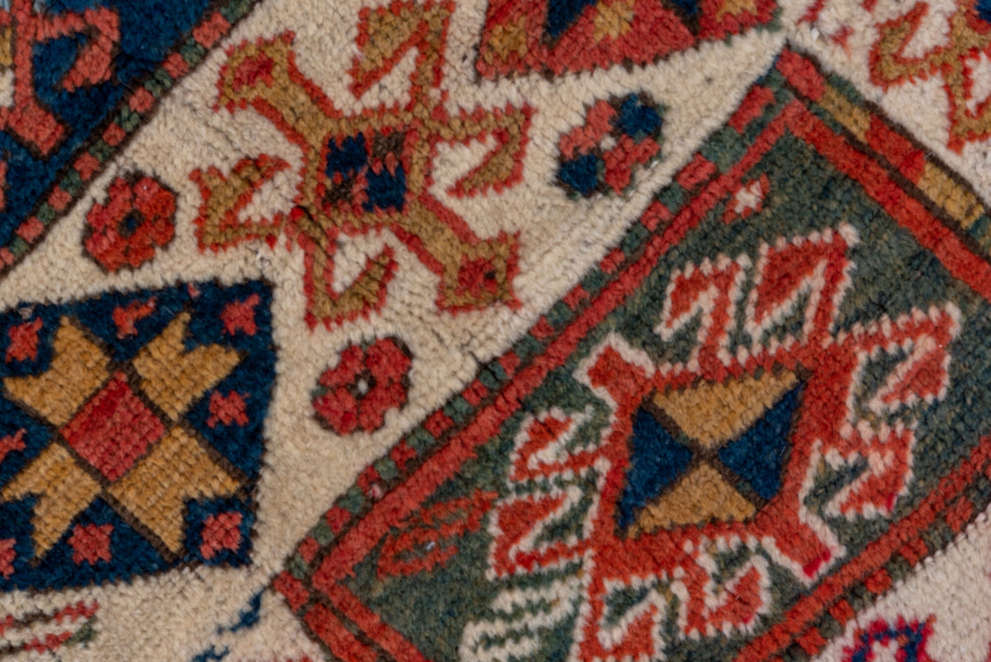 4' x 6' one-of-a-kind handmade vintage Kazak small size rug. Color palette: blue, brown, gray, pink, red