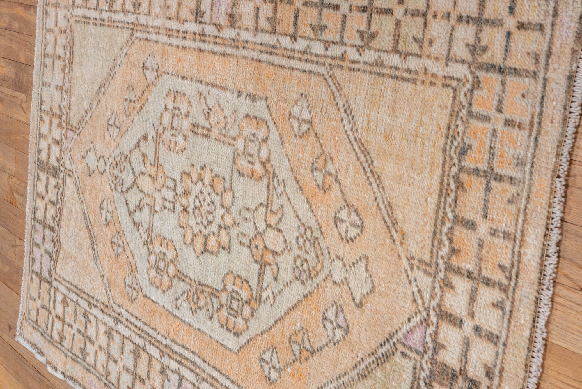 2' x 4' one-of-a-kind handmade vintage Oushak small size rug. Color palette: pink, light gray, off-white, gray, brown