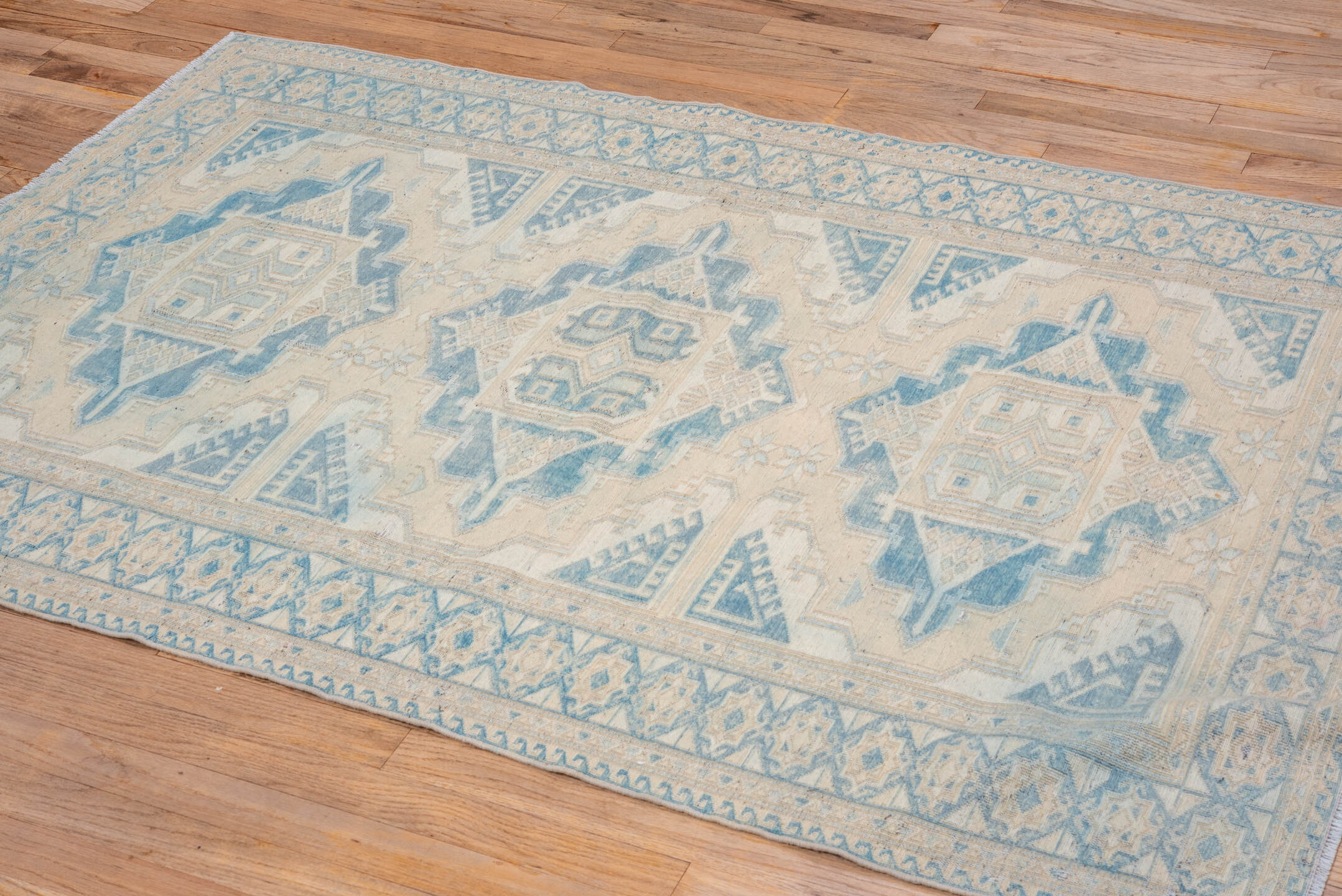 4' x 5' one-of-a-kind handmade vintage Sumak small size rug. Color palette: blue, gray, off-white, light gray, brown