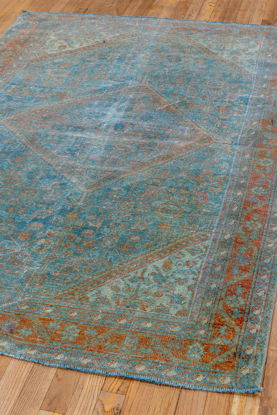 4' x 6' one-of-a-kind handmade vintage Mahal small size rug. Color palette: blue, gray, light blue, brown, light gray, black