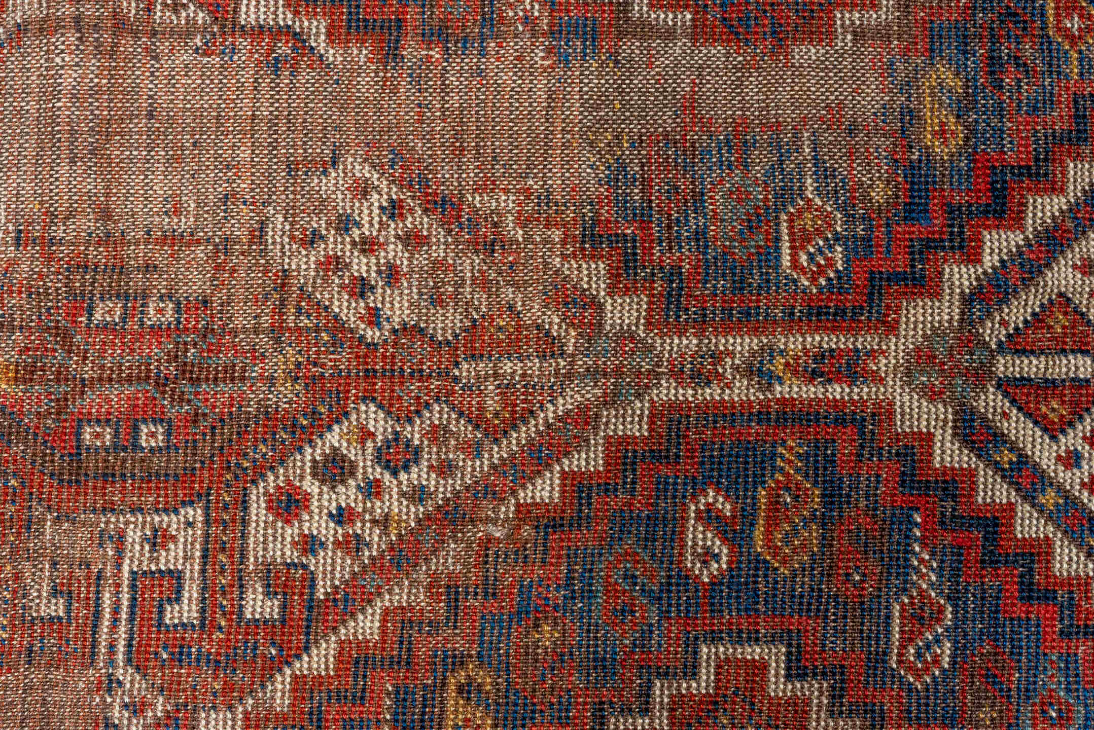 7' x 9' one-of-a-kind handmade vintage Shiraz rug. Color palette: brown, red, off-white, pink, light gray, gray, black, blue