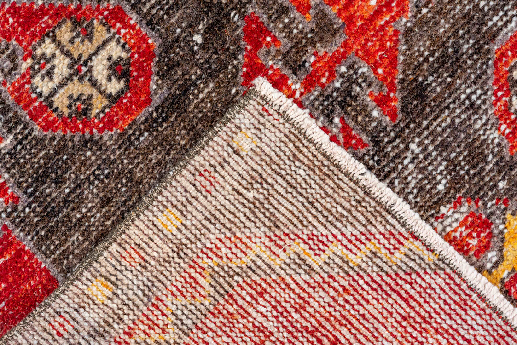 2' x 8' one-of-a-kind handmade vintage Oushak runner rug. Color palette: red, brown, pink, orange, gray, black, off-white