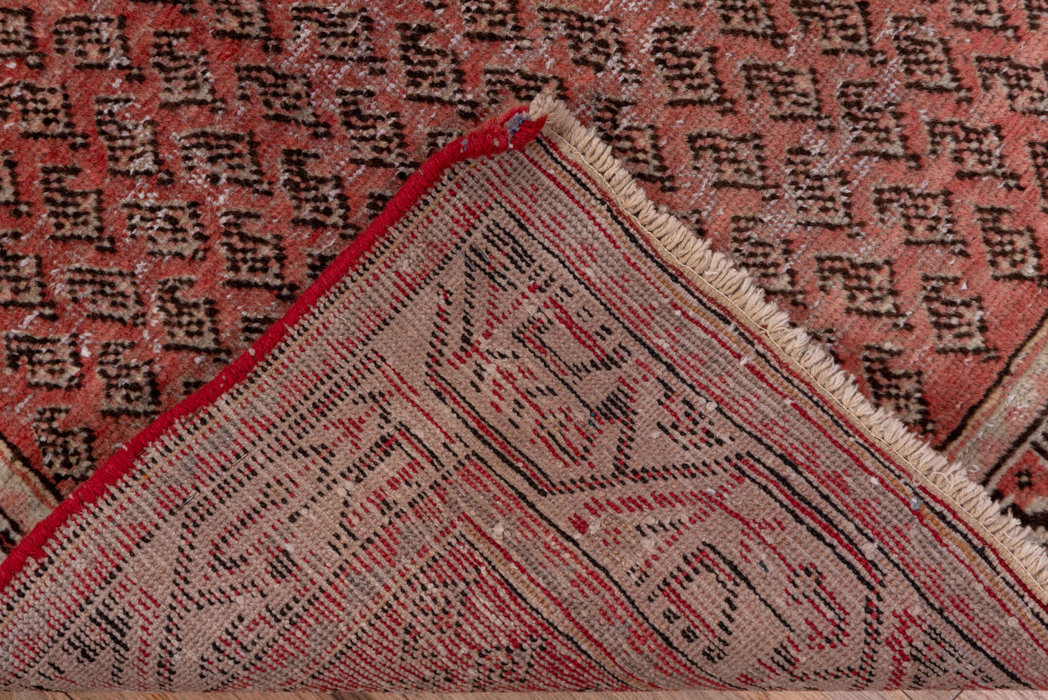 2' x 10' one-of-a-kind handmade vintage Mahal runner rug. Color palette: pink, gray, brown, red, redwood