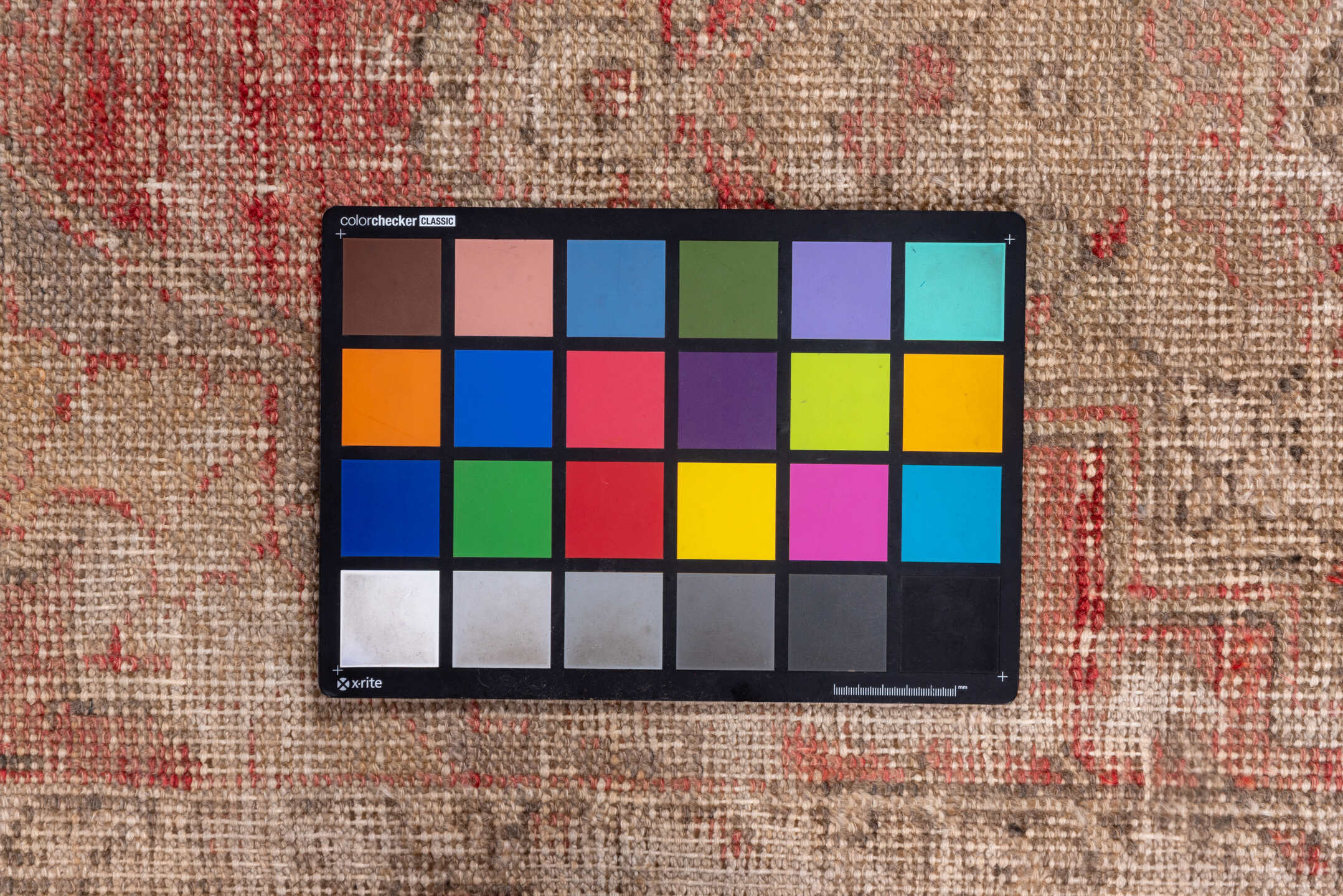 2' x 9' one-of-a-kind handmade vintage Oushak runner rug. Color palette: red, pink, brown, off-white, white, snow