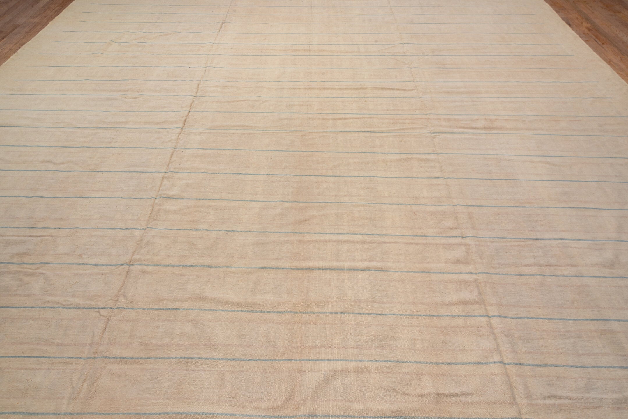 13' x 17' one-of-a-kind handmade vintage Dhurrie oversize rug. Color palette: brown, off-white, orange, gray, yellow, pink
