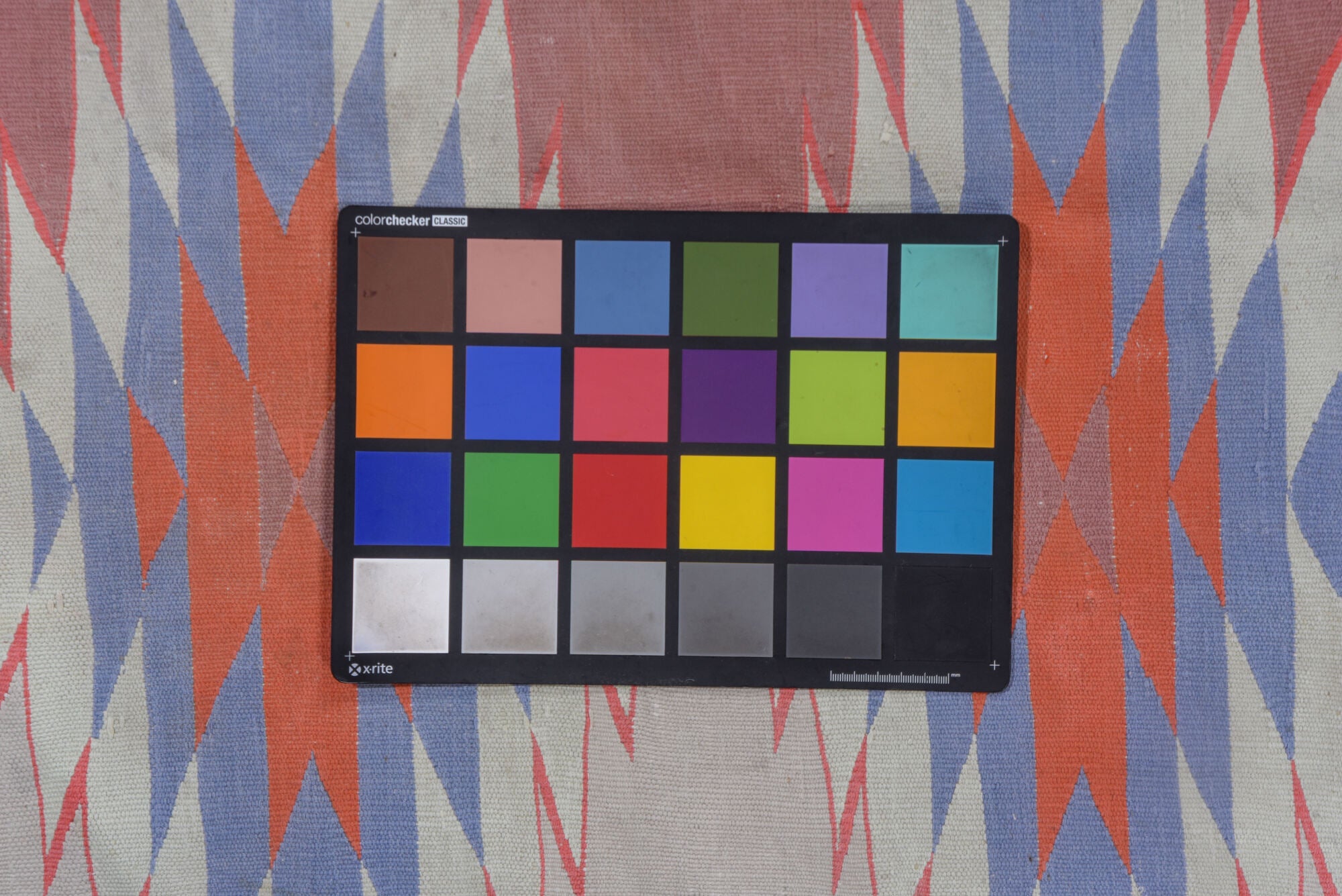 9' x 16' one-of-a-kind handmade vintage Dhurrie rug. Color palette: blue, dark gray, gray, light gray, off-white, pink, red