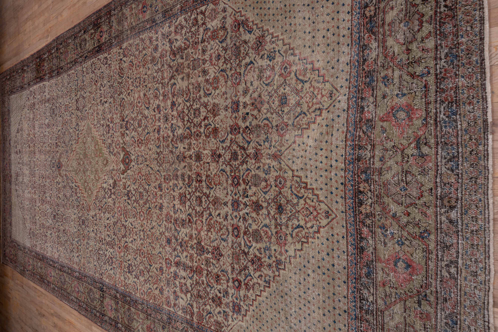 8' x 19' one-of-a-kind handmade vintage Farahan rug. Color palette: black, blue, brown, charcoal, gray, pink, red
