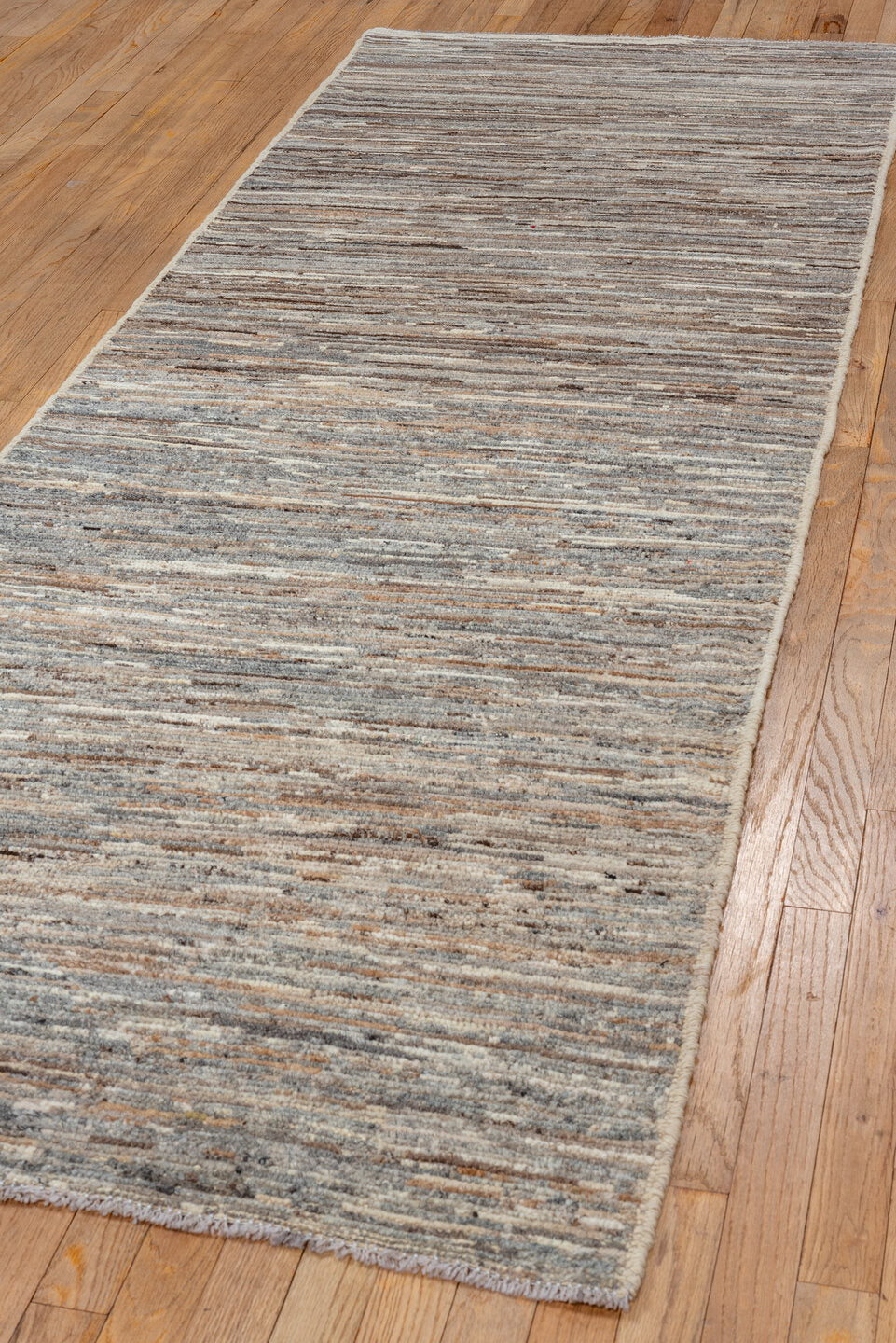 3' x 9' one-of-a-kind handmade vintage Tulu runner rug. Color palette: brown, gray, light gray, off-white