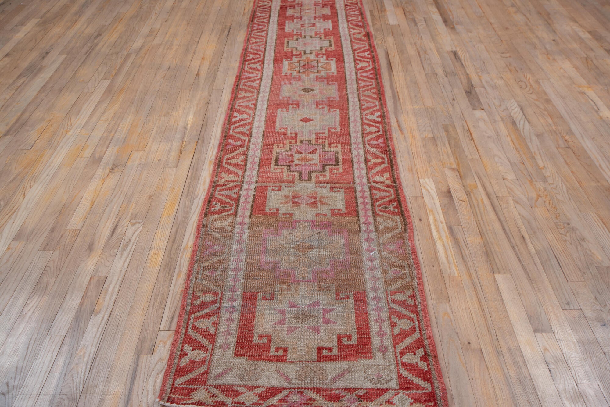 2' x 12' one-of-a-kind handmade vintage Oushak runner rug. Color palette: brown, gray, pink, red, rosy brown