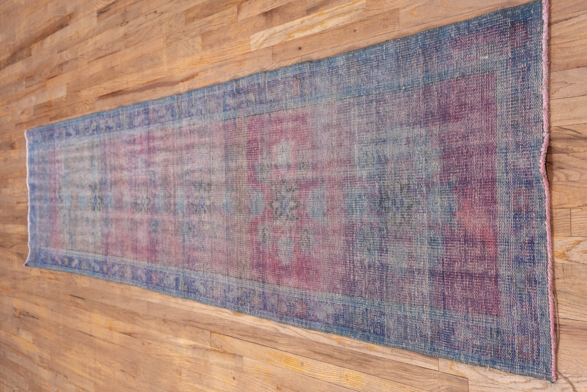 2' x 11' one-of-a-kind handmade vintage Overdyed runner rug. Color palette: brown, gray, off-white, pink, snow, white