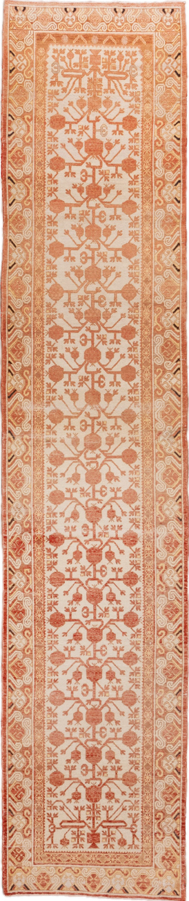 3' x 16' one-of-a-kind handmade vintage Khotan runner rug. Color palette: brown, orange, off-white, pink, white, snow