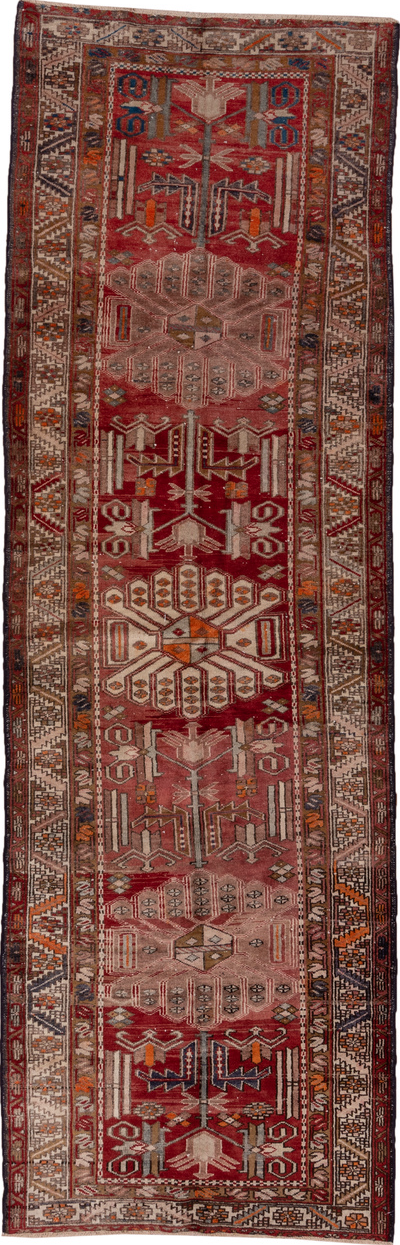 3' x 10' one-of-a-kind handmade vintage Heriz runner rug. Color palette: brown, pink, gray, red, redwood